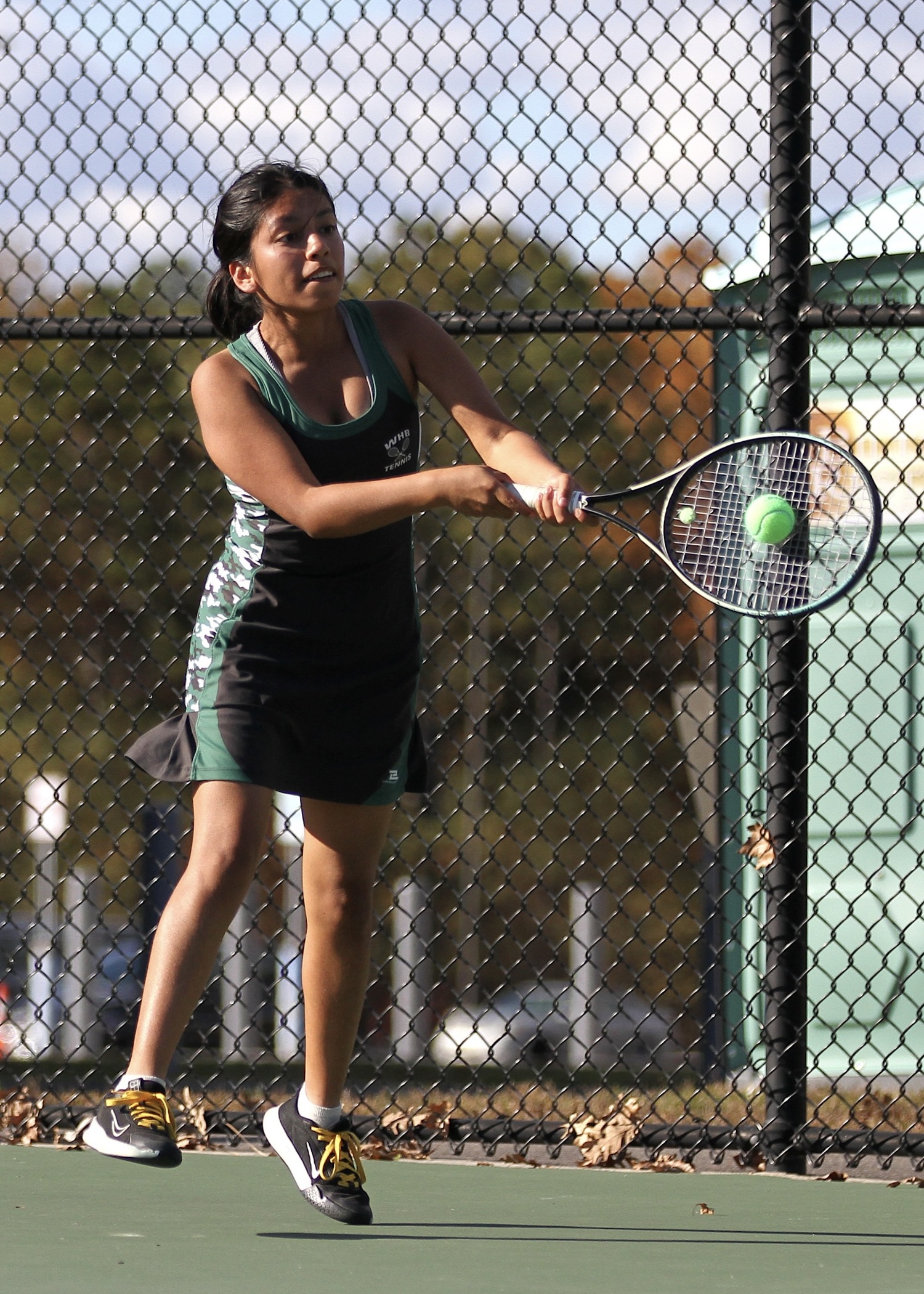 Westhampton Beach senior Abigail Gomez return a serve.  DESIRÉE KEEGAN