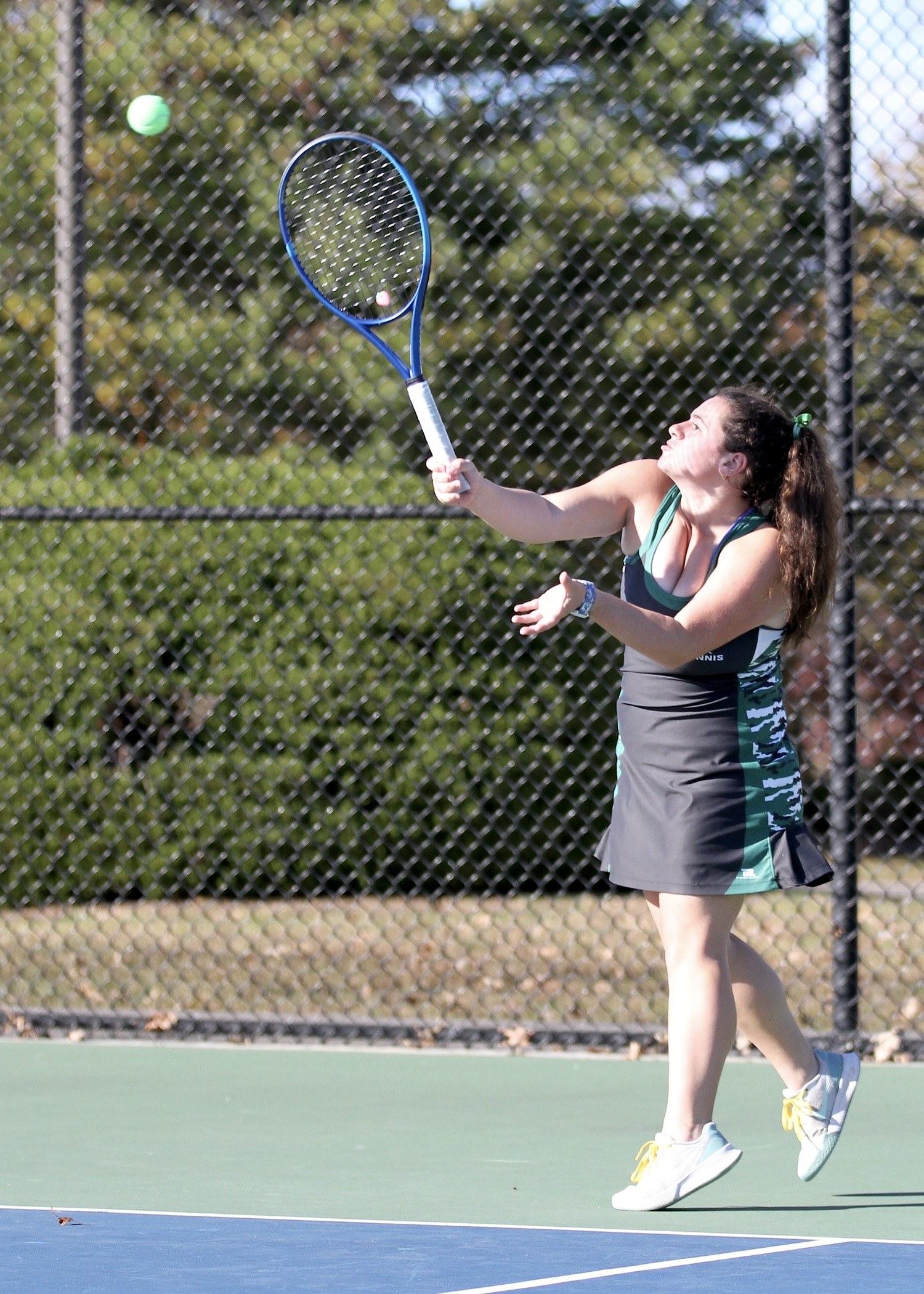 Westhampton Beach sophomore Ali Brandi serves. DESIRÉE KEEGAN