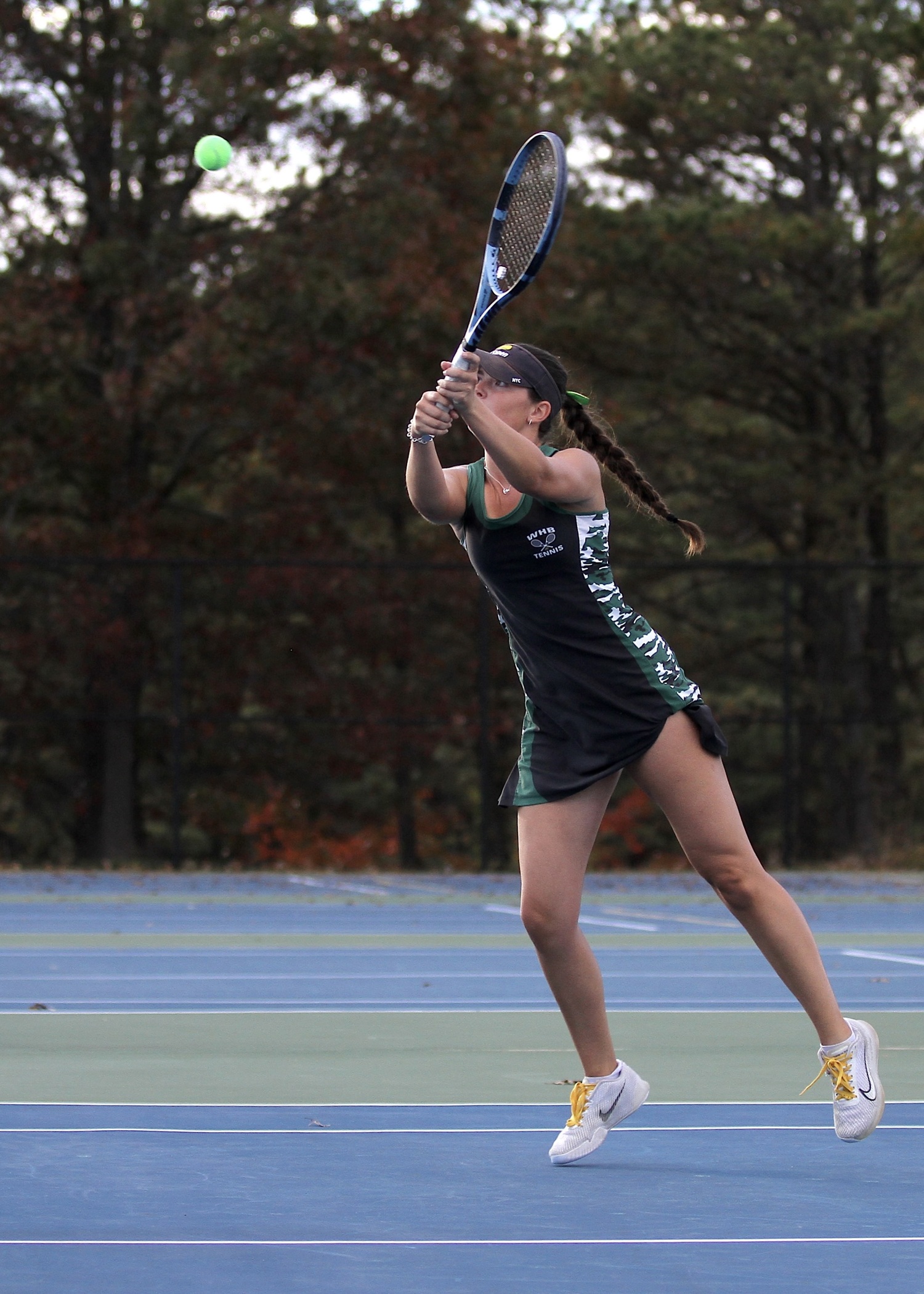 Westhampton Beach senior Ana Way volleys. DESIRÉE KEEGAN
