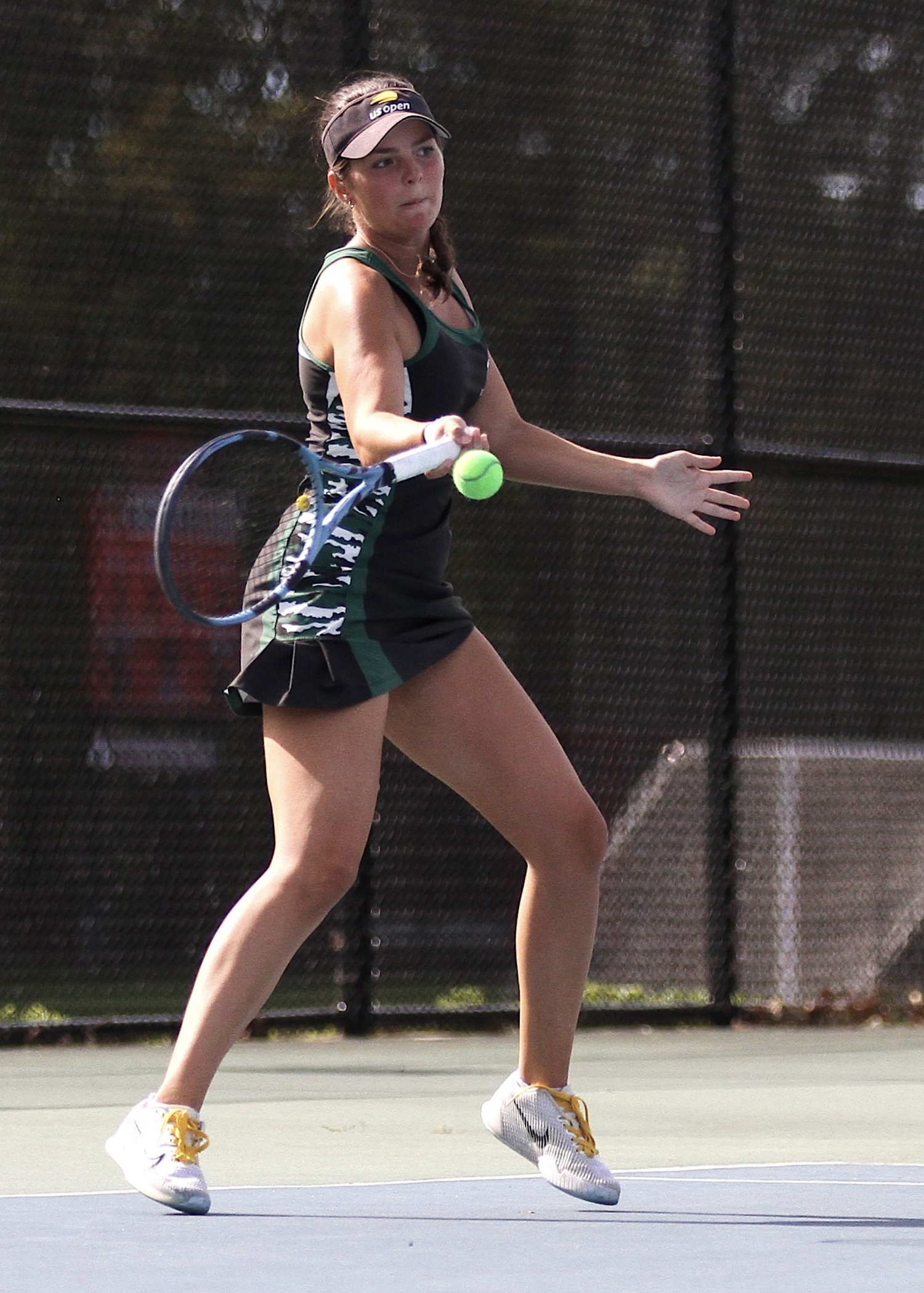 Westhampton Beach senior Ana Way pushes the ball back over the net. DESIRÉE KEEGAN