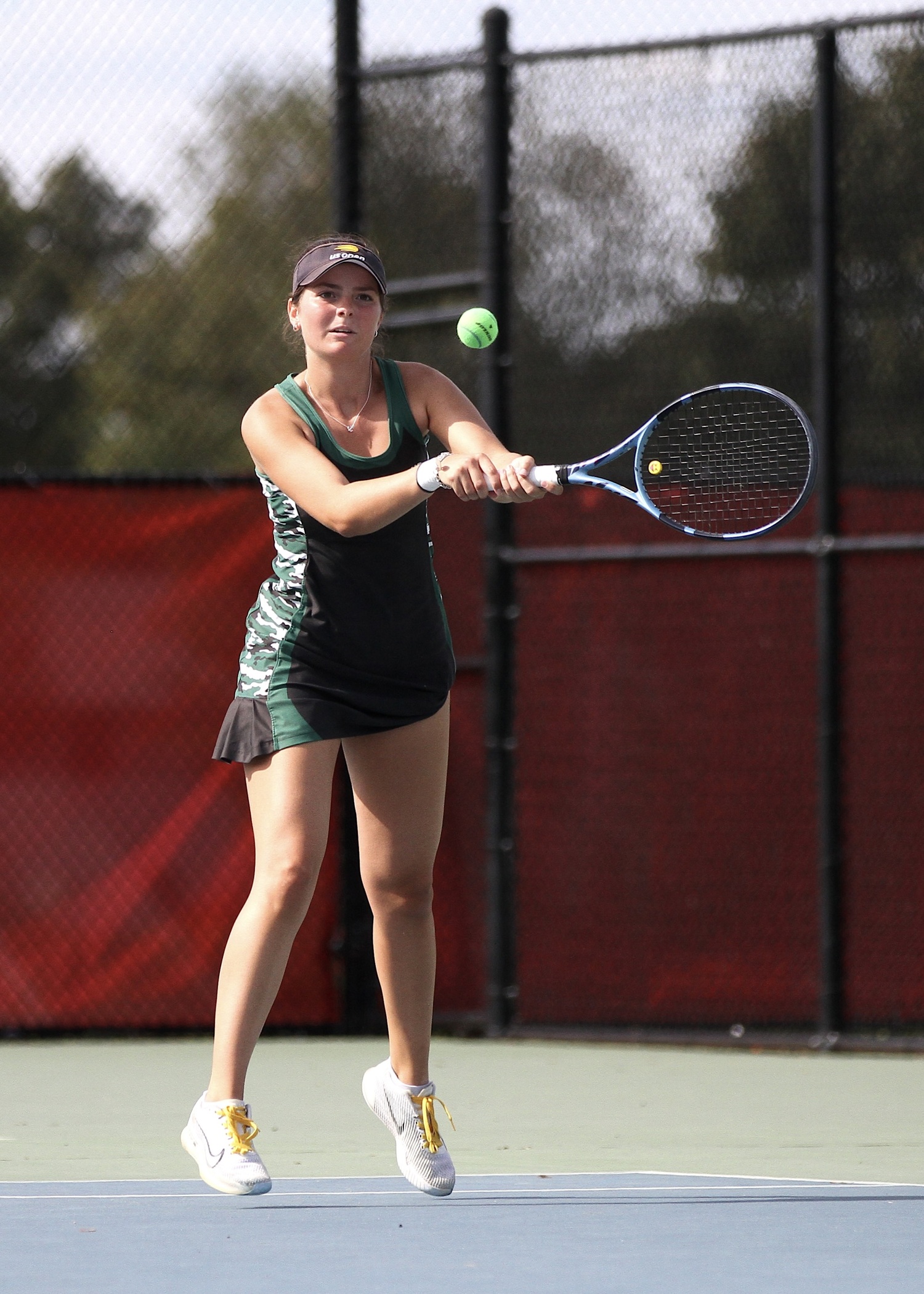 Westhampton Beach senior Ana Way returns a serve. DESIRÉE KEEGAN