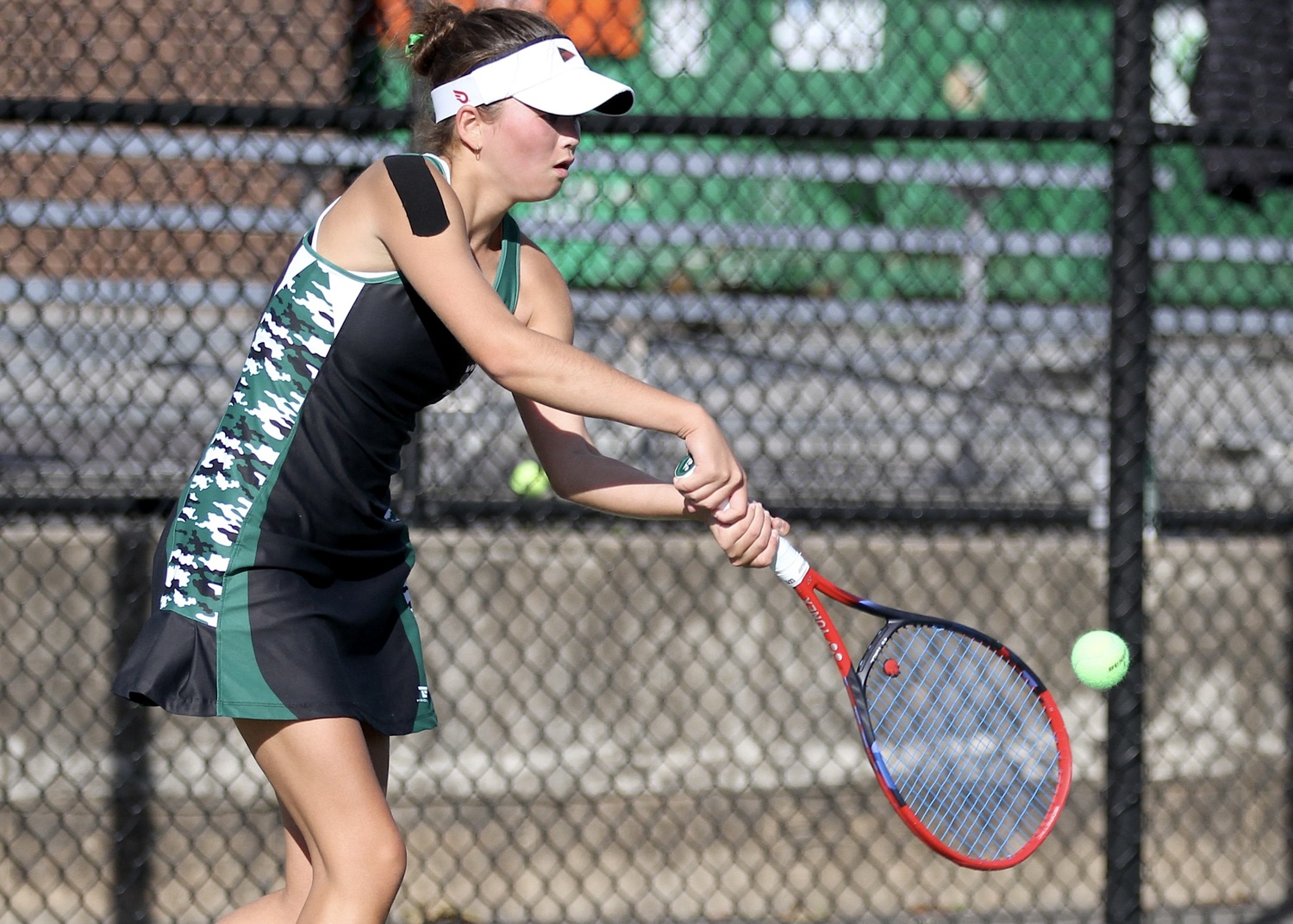 Westhampton Beach senior Diana Elliott returns a serve. DESIRÉE KEEGAN
