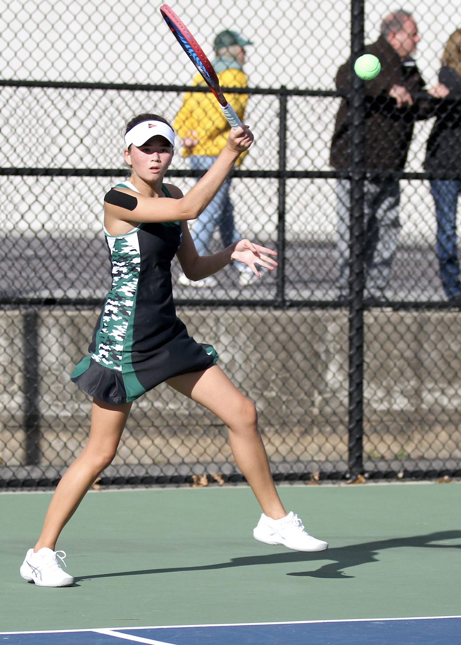 Westhampton Beach senior Diana Elliott slices the ball. DESIRÉE KEEGAN