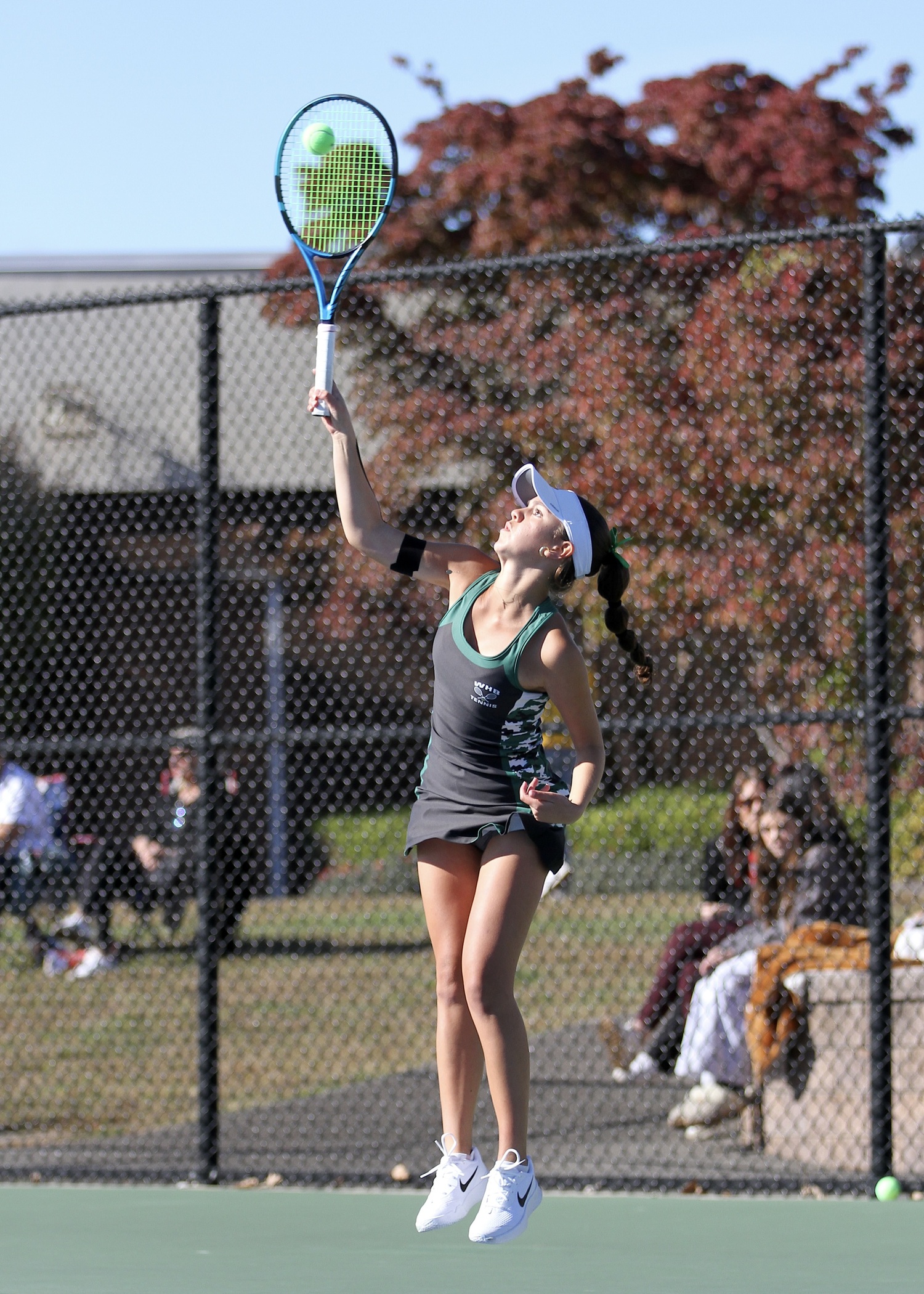 Westhampton Beach freshman Gabriela Arango serves. DESIRÉE KEEGAN