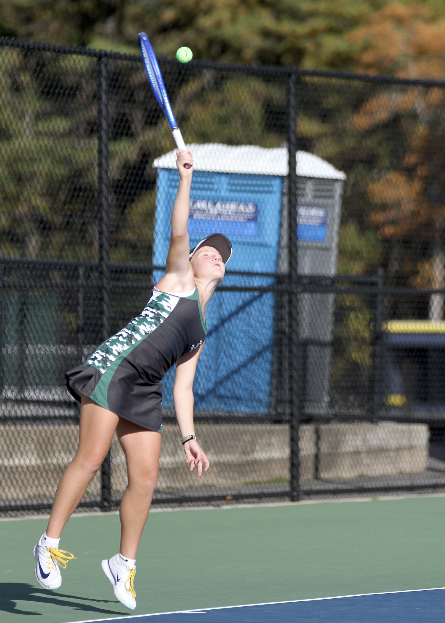 Westhampton Beach sophomore Grace Hart serves. DESIRÉE KEEGAN