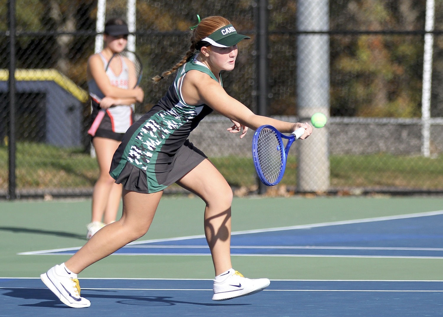 Westhampton Beach sophomore Grace Hart pushes the ball back over the net. DESIRÉE KEEGAN