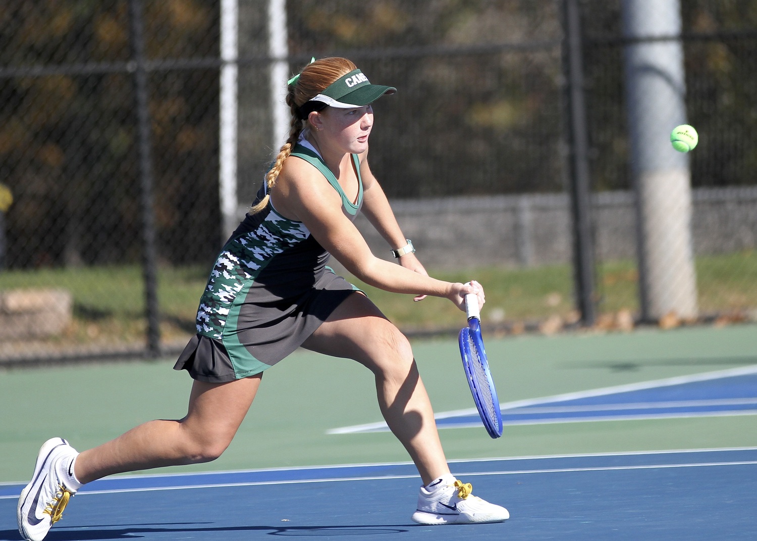 Westhampton Beach sophomore Grace Hart  reaches for a return. DESIRÉE KEEGAN