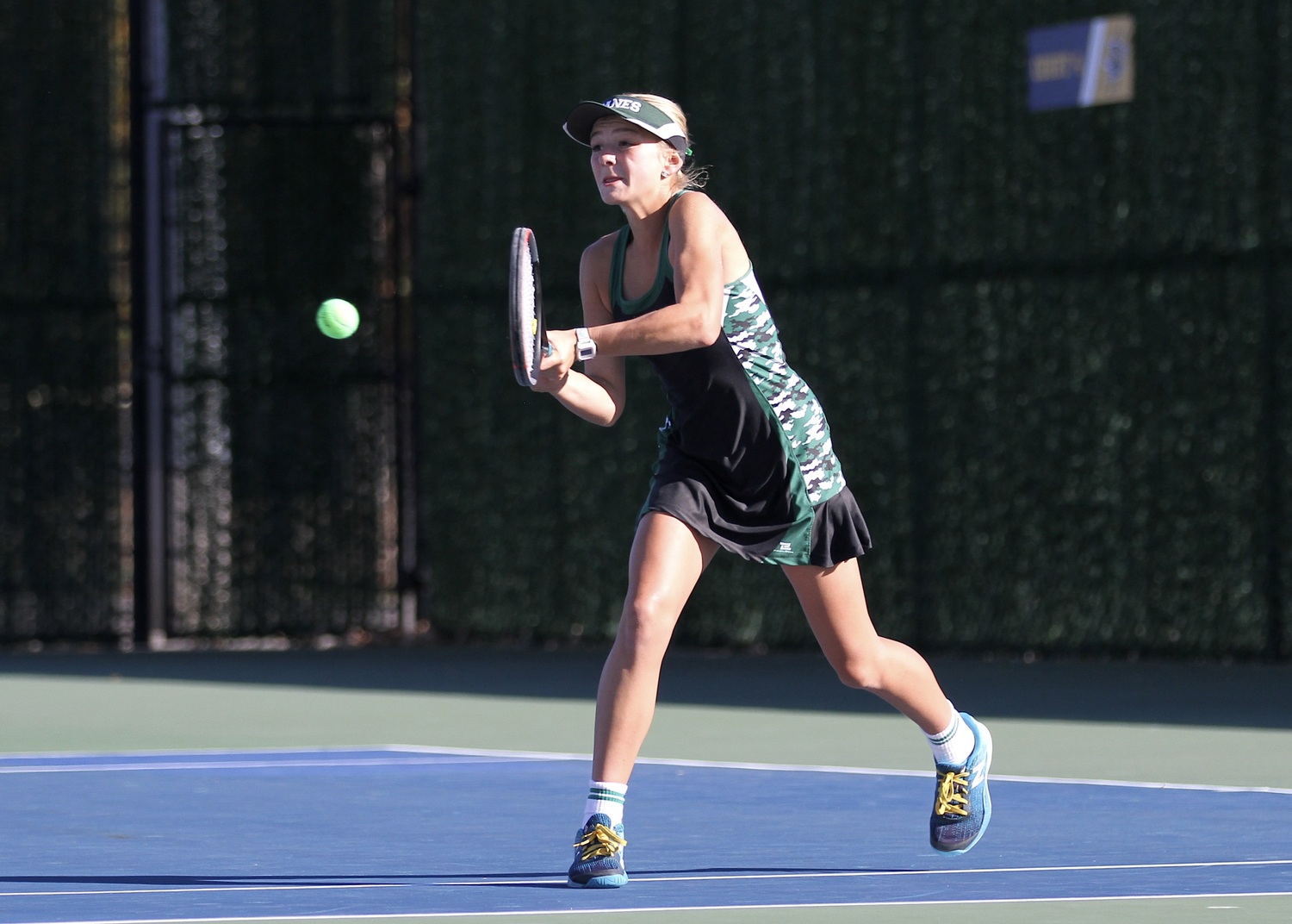 Westhampton Beach seventh-grader Riley Magner powers the ball back over the net. DESIRÉE KEEGAN