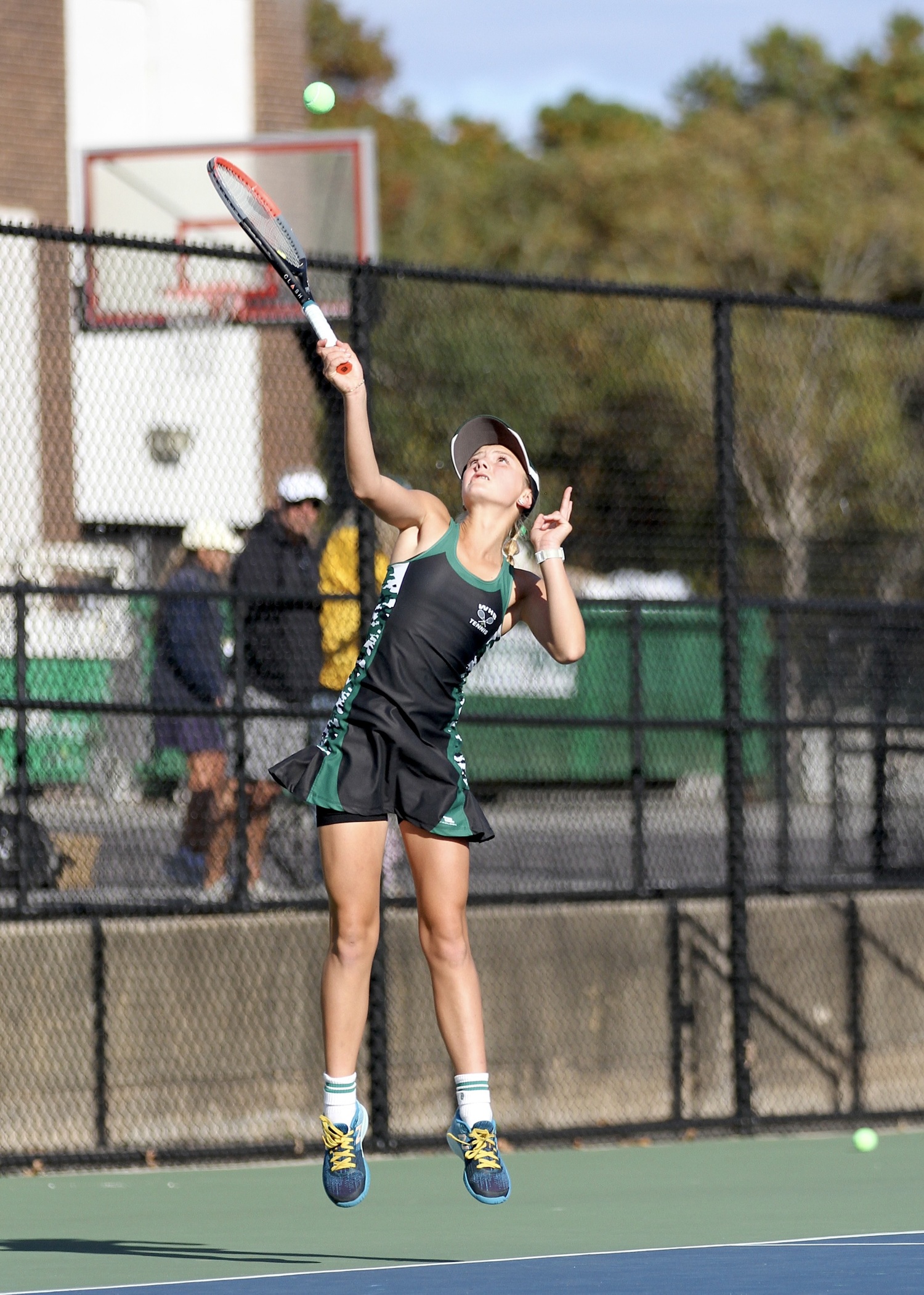 Westhampton Beach seventh-grader Riley Magner serves. DESIRÉE KEEGAN