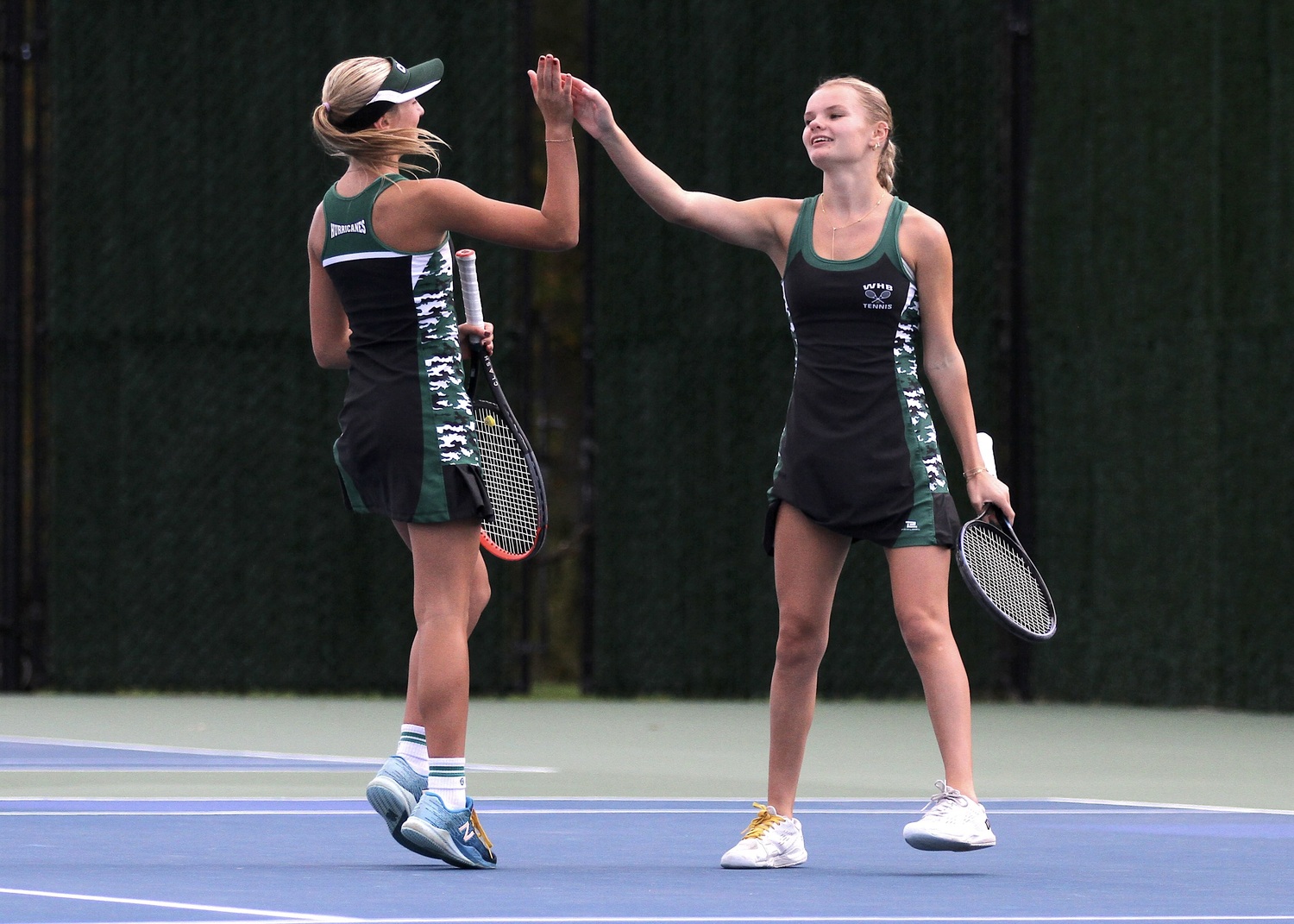 Seventh-grader Riley Magner and junior Maddie Montgomery. DESIRÉE KEEGAN