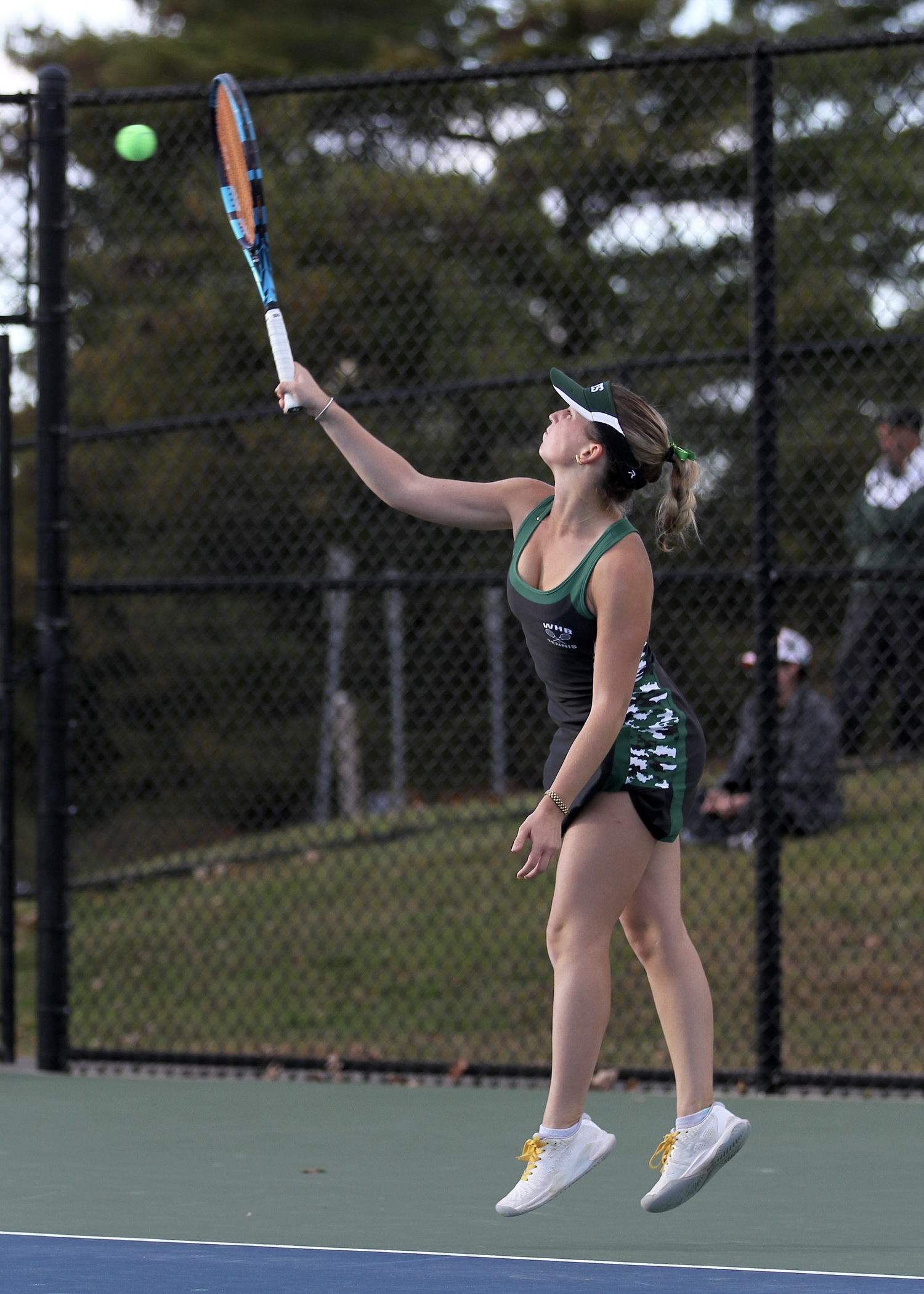 Westhampton Beach senior Tess Ashley serves. DESIRÉE KEEGAN