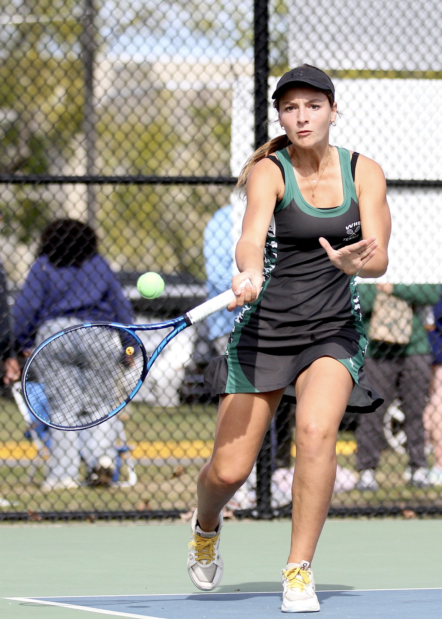 Westhampton Beach junior Zoë Grellet-Aumont  sends the ball back over the net. DESIRÉE KEEGAN