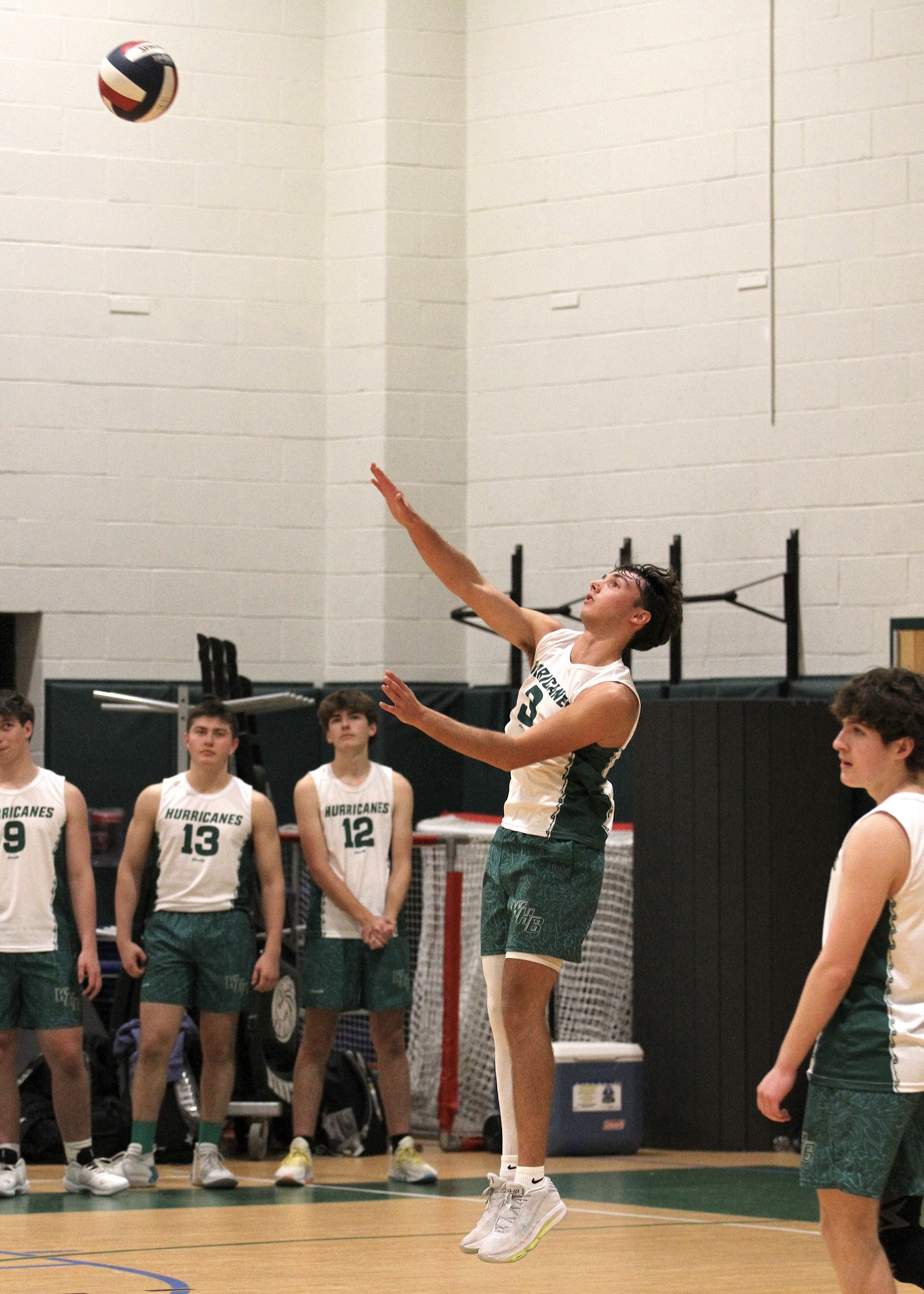 Westhampton Beach senior Cameron Giordano serves. DESIRÉE KEEGAN