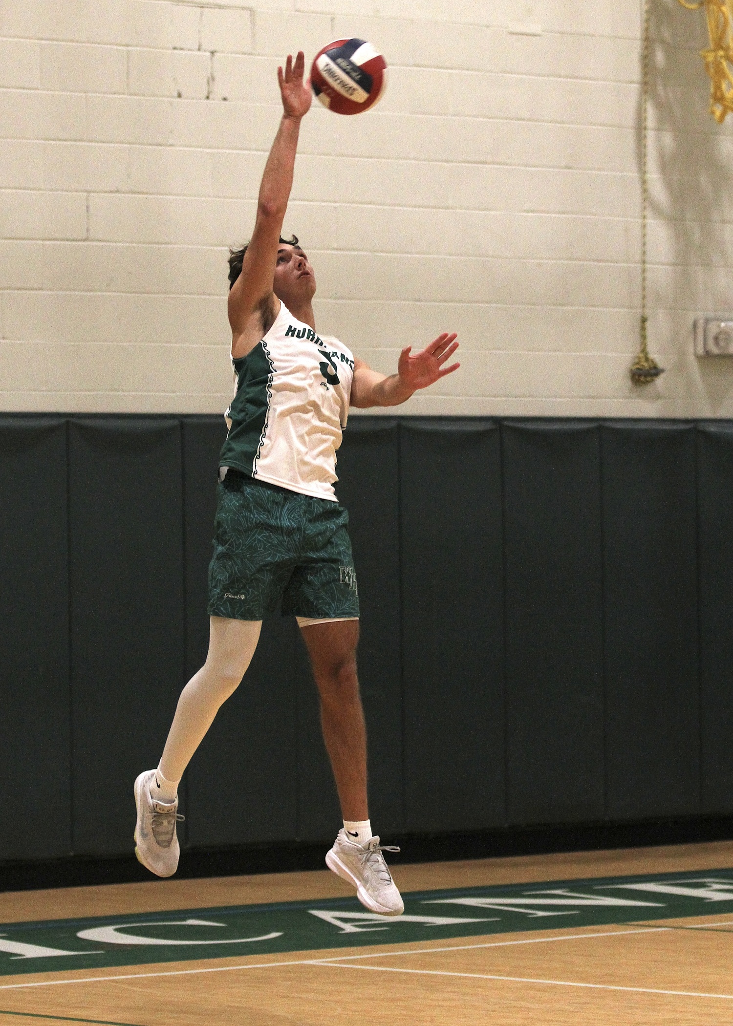 Westhampton Beach senior Cameron Giordano serves. DESIRÉE KEEGAN
