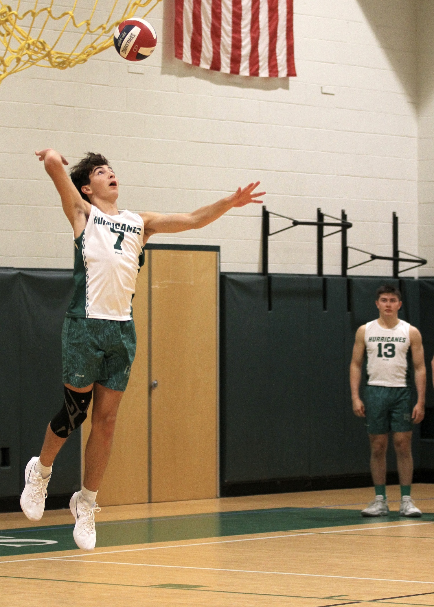 Westhampton Beach junior outside hitter Gabe Monserrate serves. DESIRÉE KEEGAN