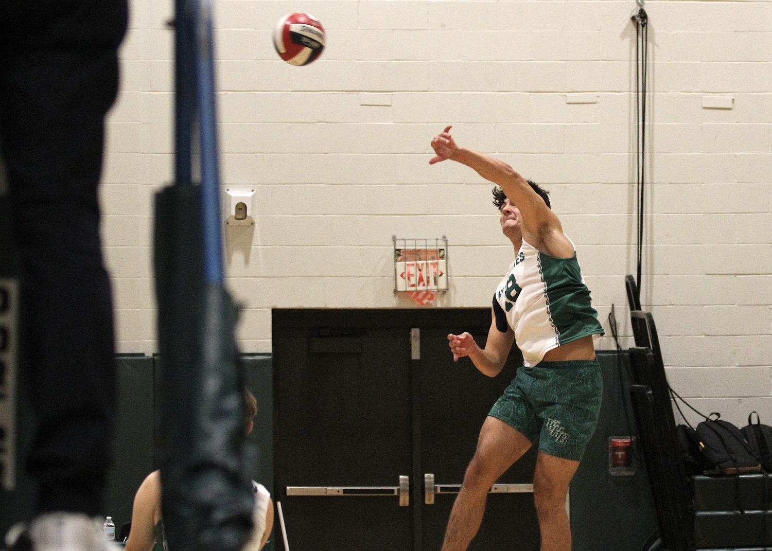 Westhampton Beach senior right side Jude Allen spikes the ball. DESIRÉE KEEGAN