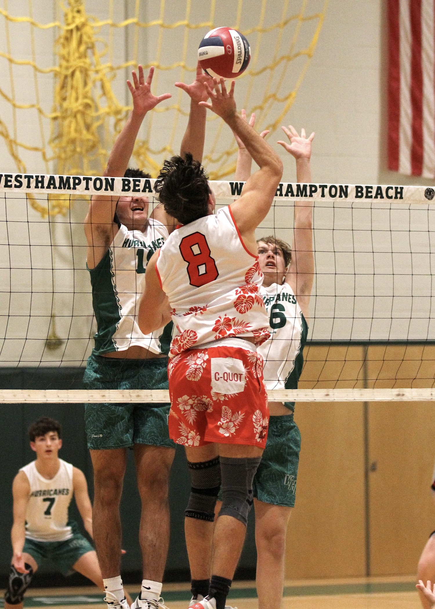Westhampton Beach senior right side Jude Allen and sophomore middle hitter Luca Caumartin leap for a block. DESIRÉE KEEGAN