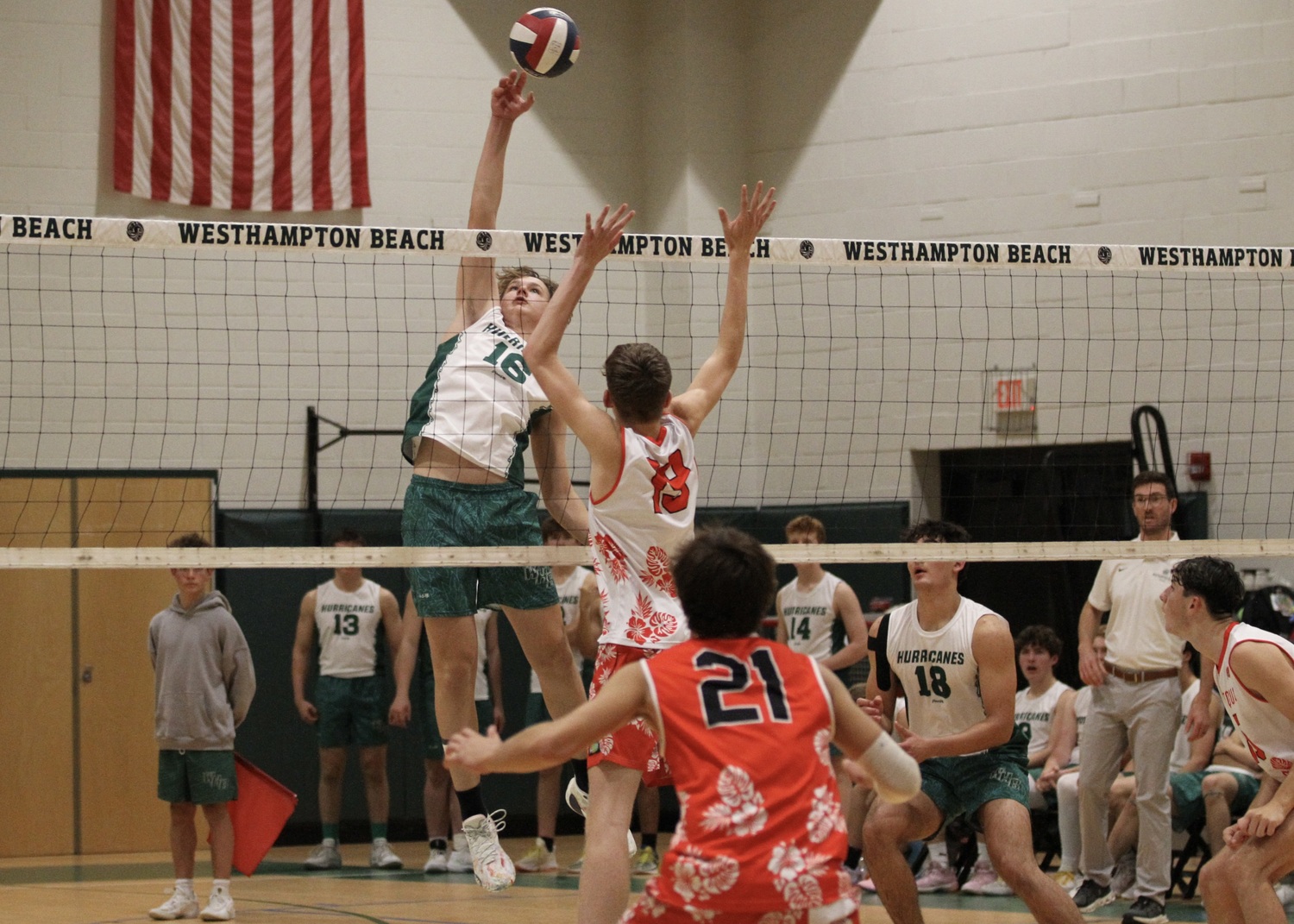 Westhampton Beach sophomore middle hitter Luca Caumartin slams the ball over the net. DESIRÉE KEEGAN