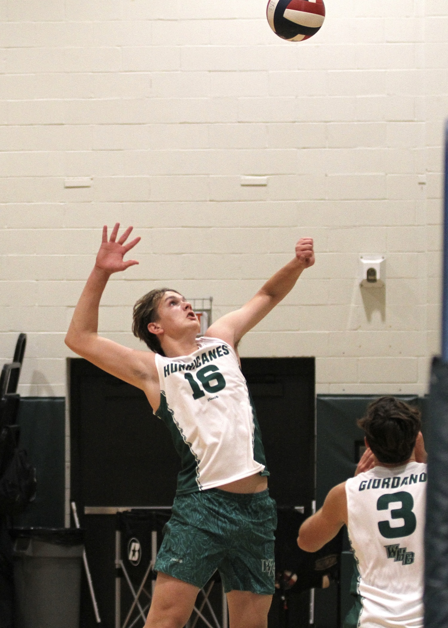 Westhampton Beach sophomore middle hitter Luca Caumartin waits for the ball. DESIRÉE KEEGAN