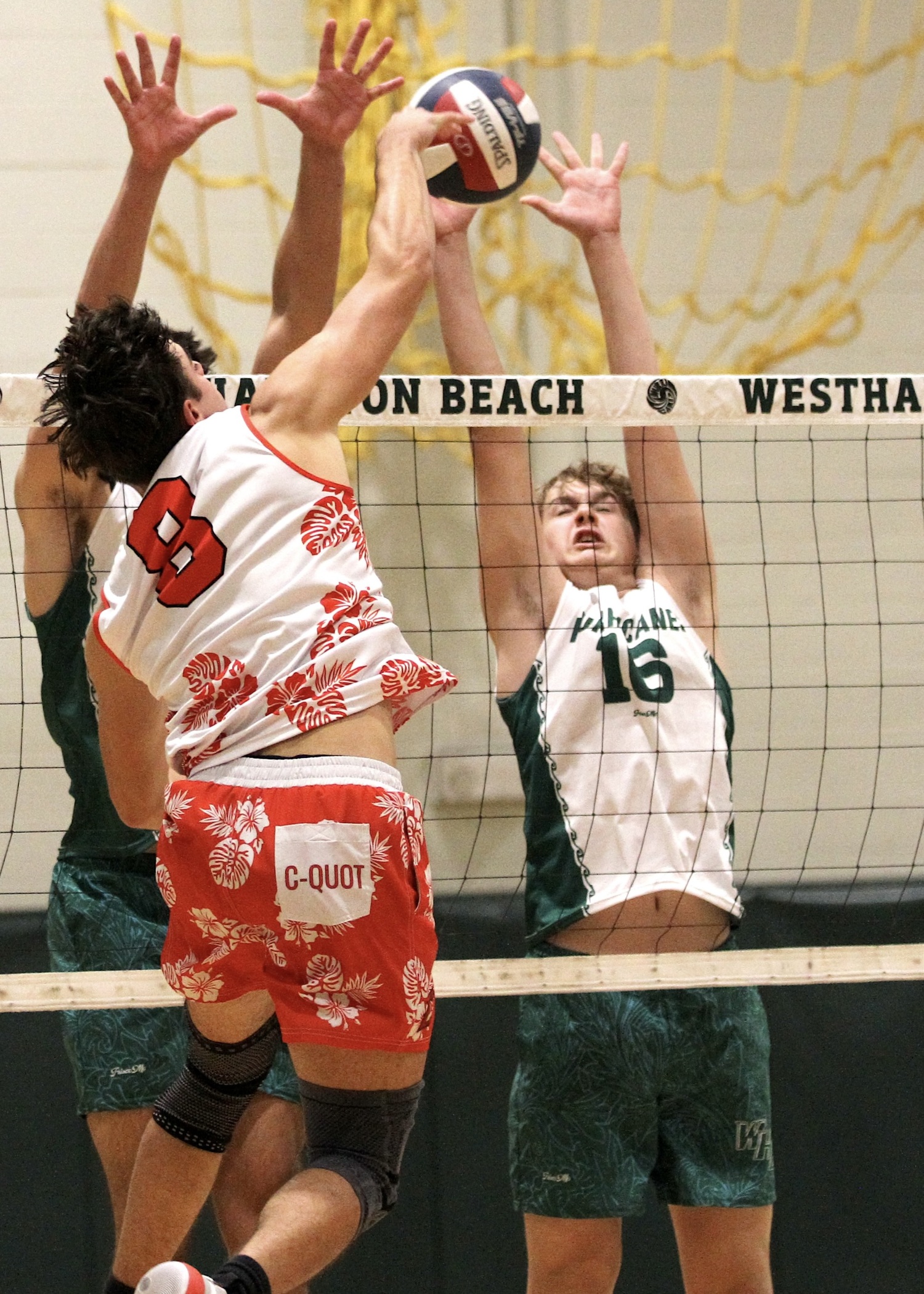 Westhampton Beach sophomore middle hitter Luca Caumartin goes up for a block. DESIRÉE KEEGAN