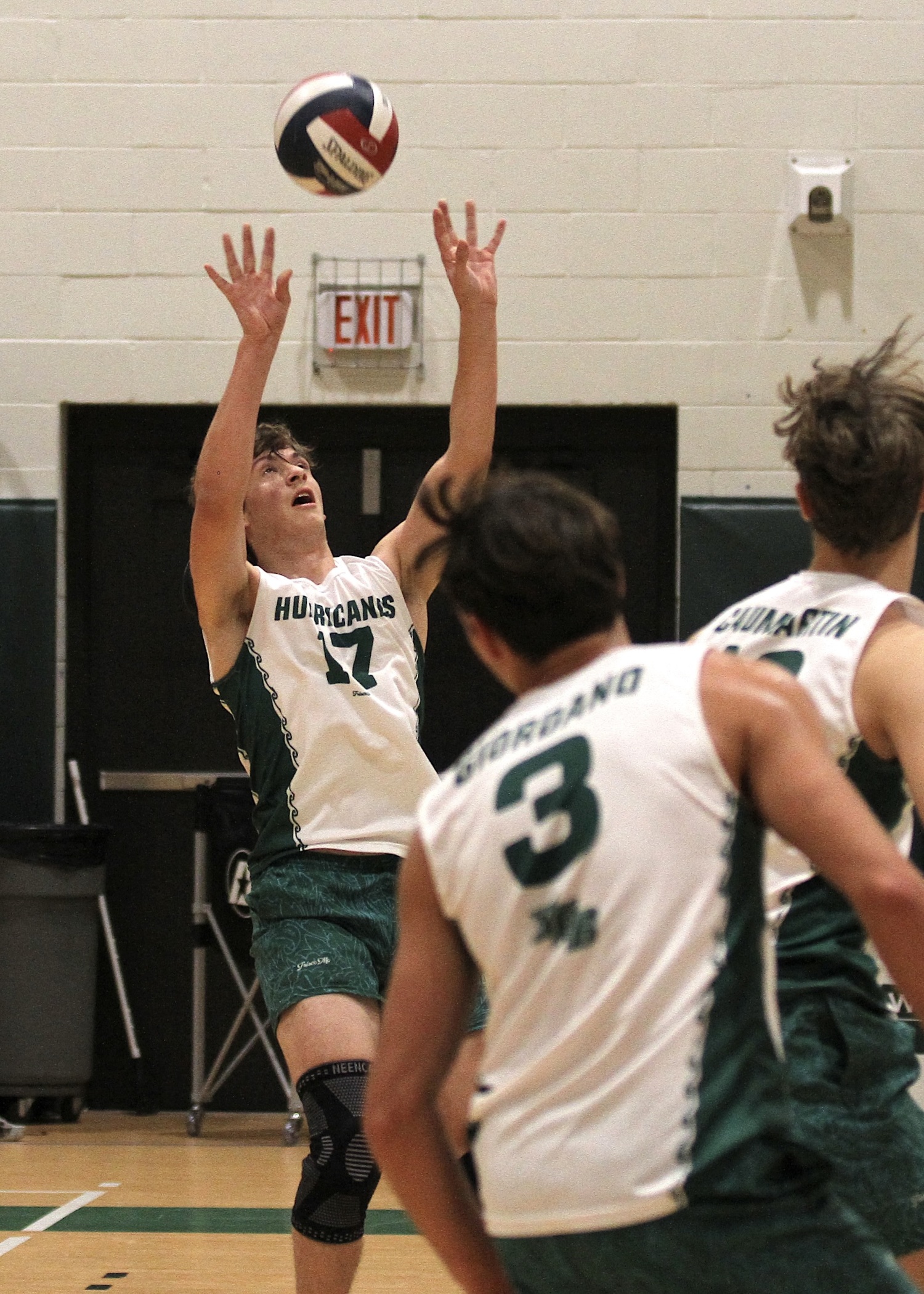 Westhampton Beach senior outside hitter Thomas Livia sets up a play. DESIRÉE KEEGAN