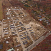Southampton Town will go to court in an attempt to halt redevelopment work at the former Lier's Mobile Home Park, which is now owned by the luxury home building Farrell Companies.
