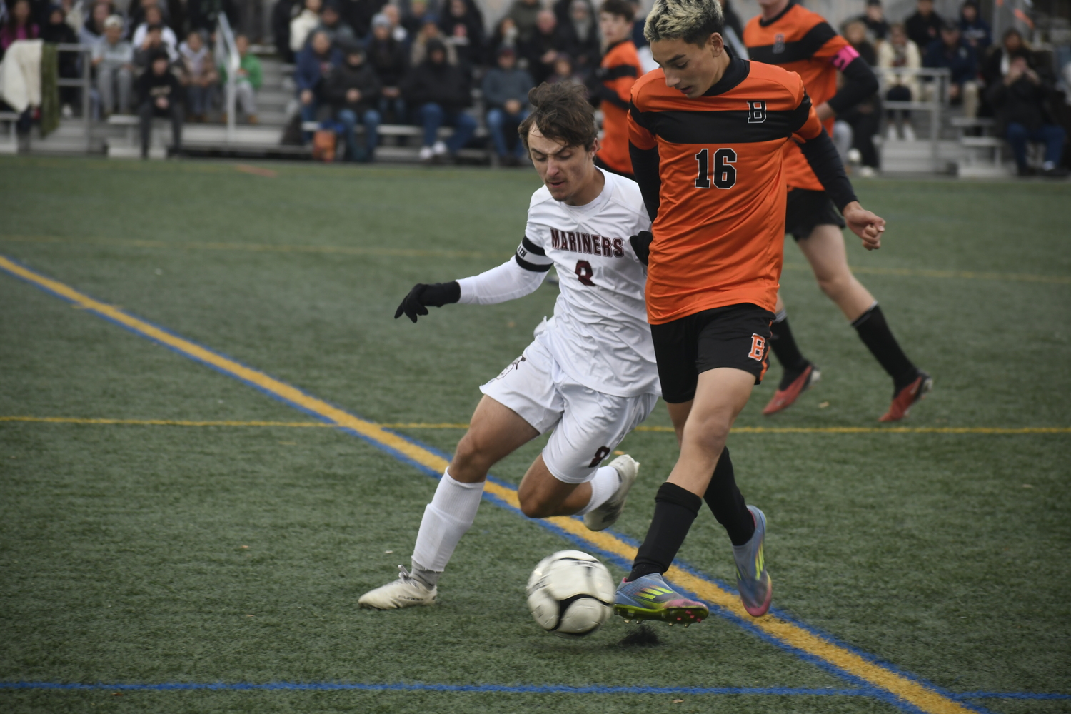 Southampton junior co-captain Max Mobius disrupts Babylon freshman Antonio Bartolotta.  DREW BUDD