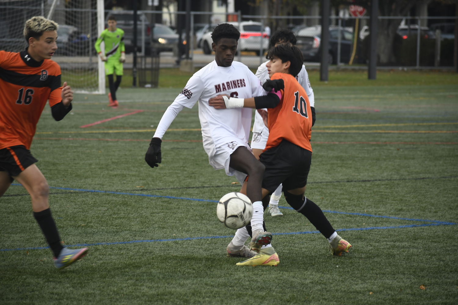 Southampton sophomore Tristyn Sammy tries to get rid of the ball before Babylon junior Christian Pena comes in.  DREW BUDD