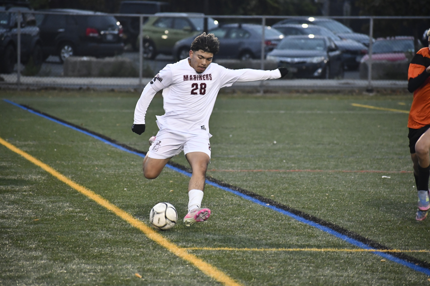 Southampton senior co-captain Leo Estrada races the ball down the sideline. DREW BUDD