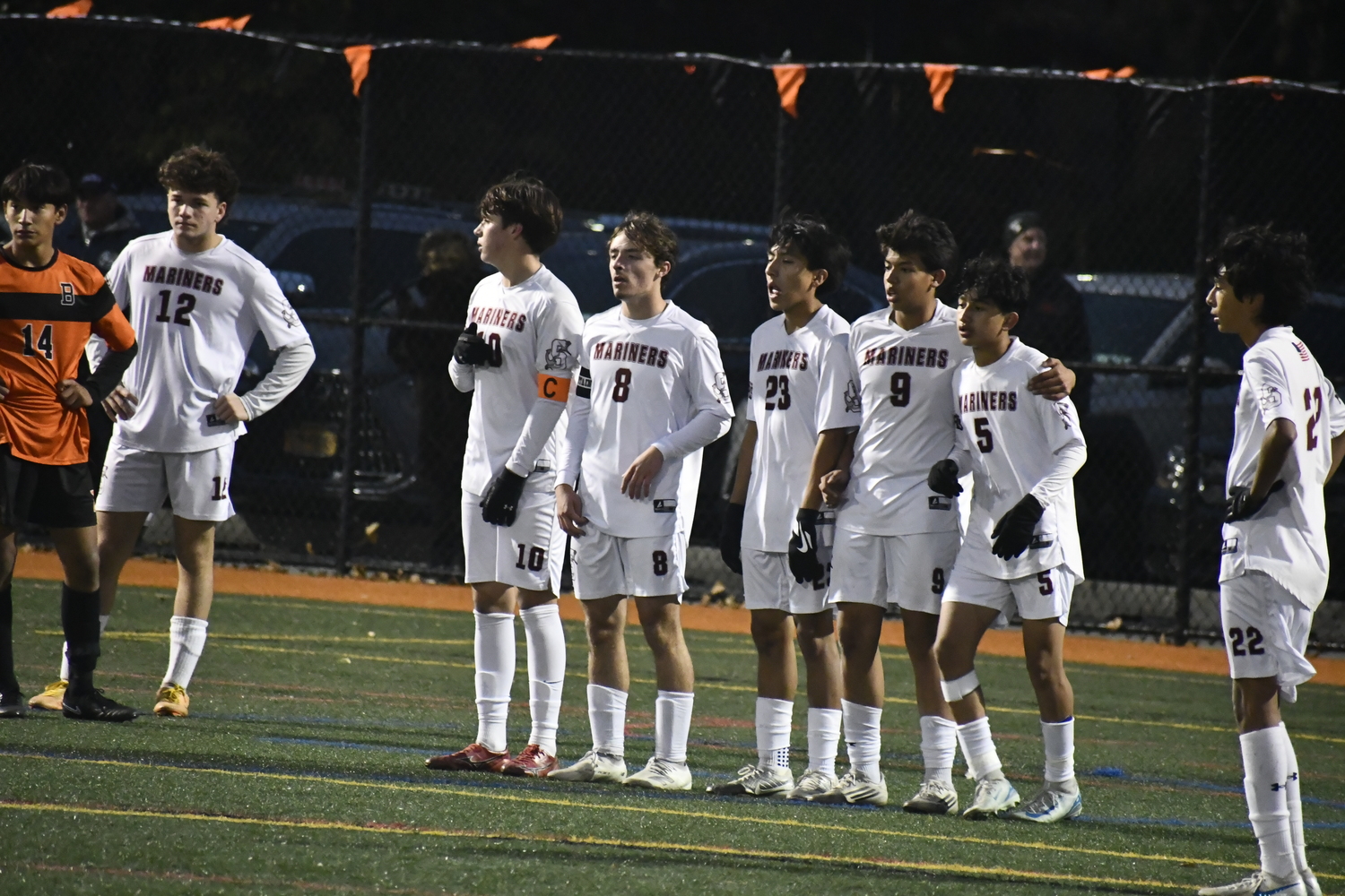The Mariners set up a defensive wall with a Babylon free kick upcoming.  DREW BUDD