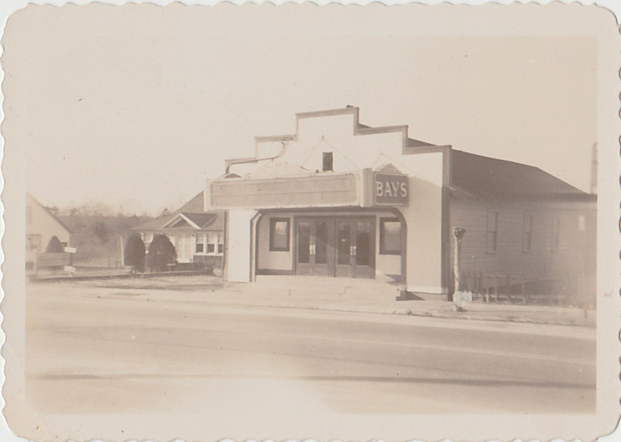 The Hampton Bays movie theater, circa 1949, where John Siebold worked as a projectionist before starting his own business as a TV and radio repairman. John Siebold, a World War II veteran who served with the Merchant Marines, was an avid surfcaster and loved to spend his free time at the beach, catching large bass. COURTESY SIEBOLD FAMILY