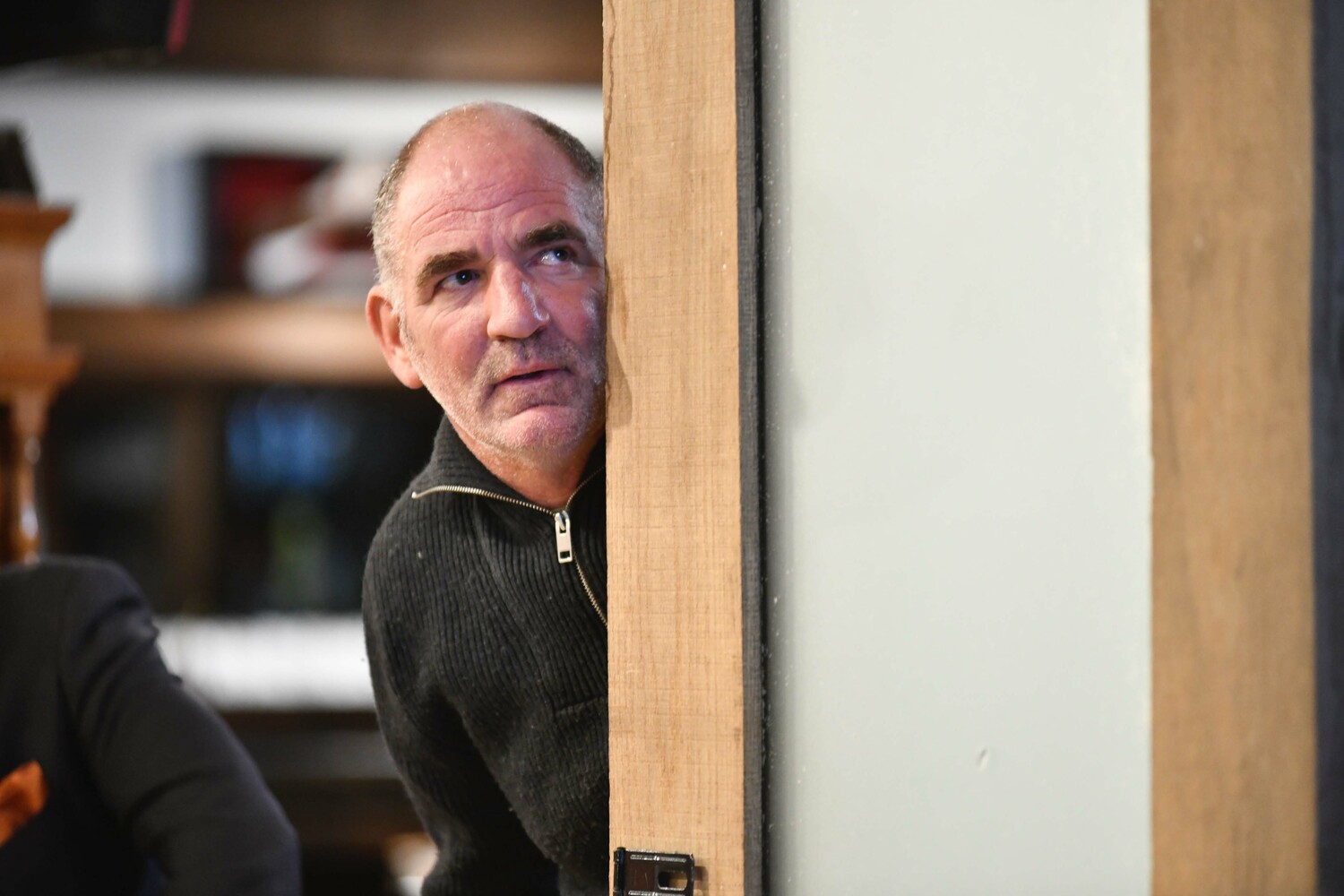 Southampton Town Trustee incumbent Chip Maran watches election results come in on Tuesday night.  DANA SHAW