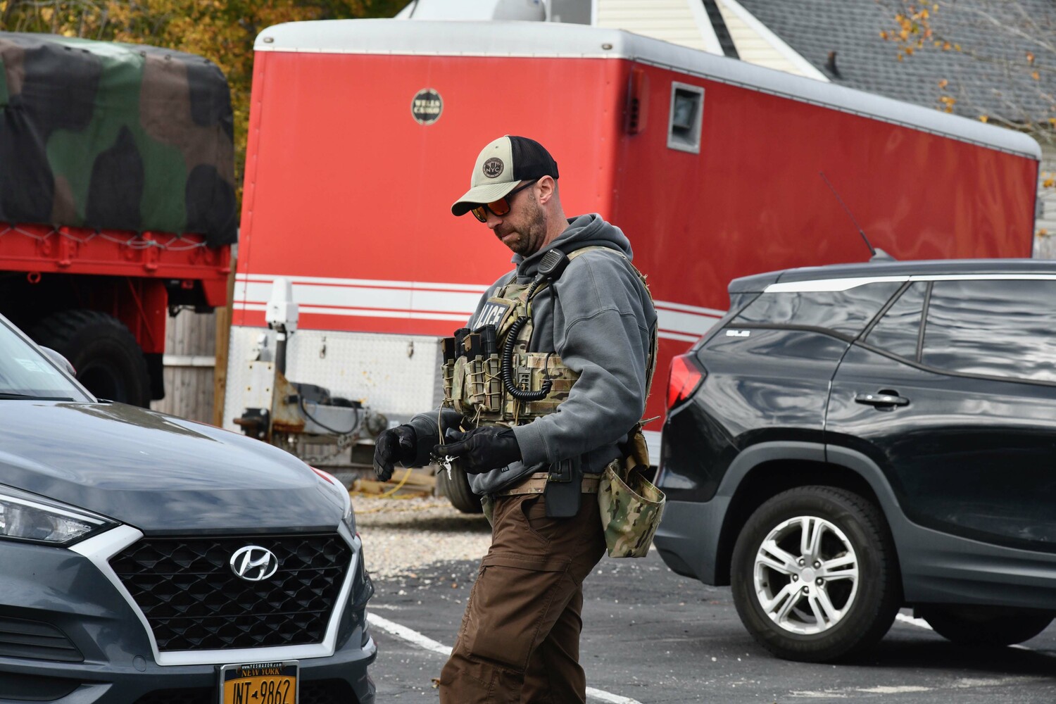 Federal immigration enforcement agents at the Hampton Bays firehouse on November 5.  DANA SHAW
