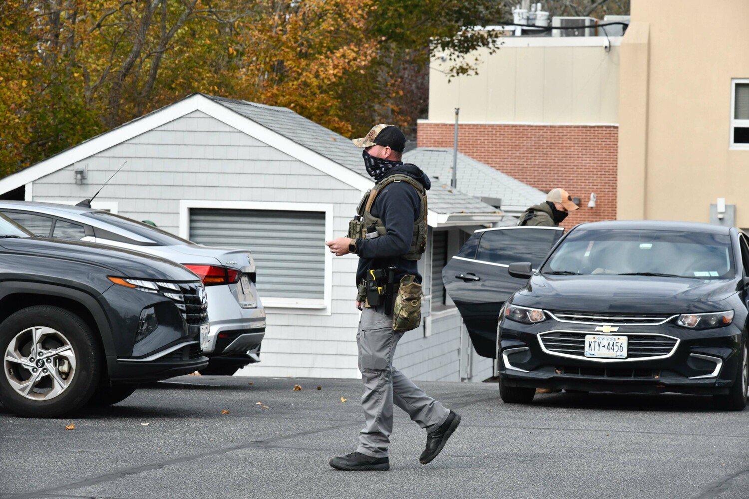Federal immigration enforcement agents at the Hampton Bays firehouse on November 5.  DANA SHAW