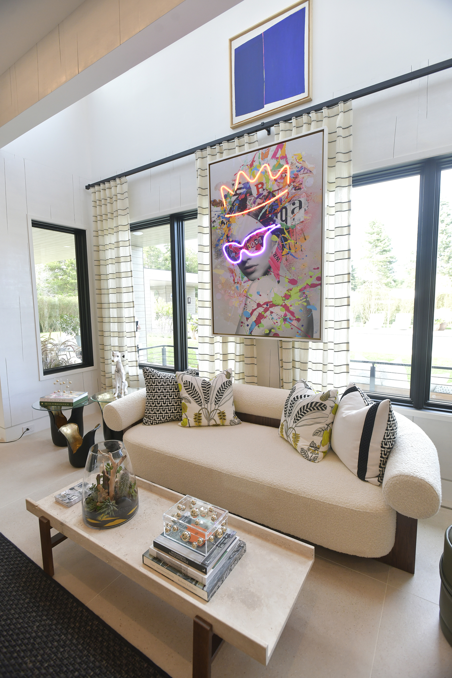 Protesters lined Montauk Highway in Hampton Bays on Friday morning voicing their objections to immigration raids that ensnared several people in the community and in Westhampton and Riverhead earlier in the week. DANA SHAW