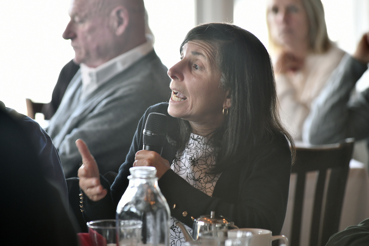 Audience member Gayle Lombardi Makes a point.  DANA SHAW