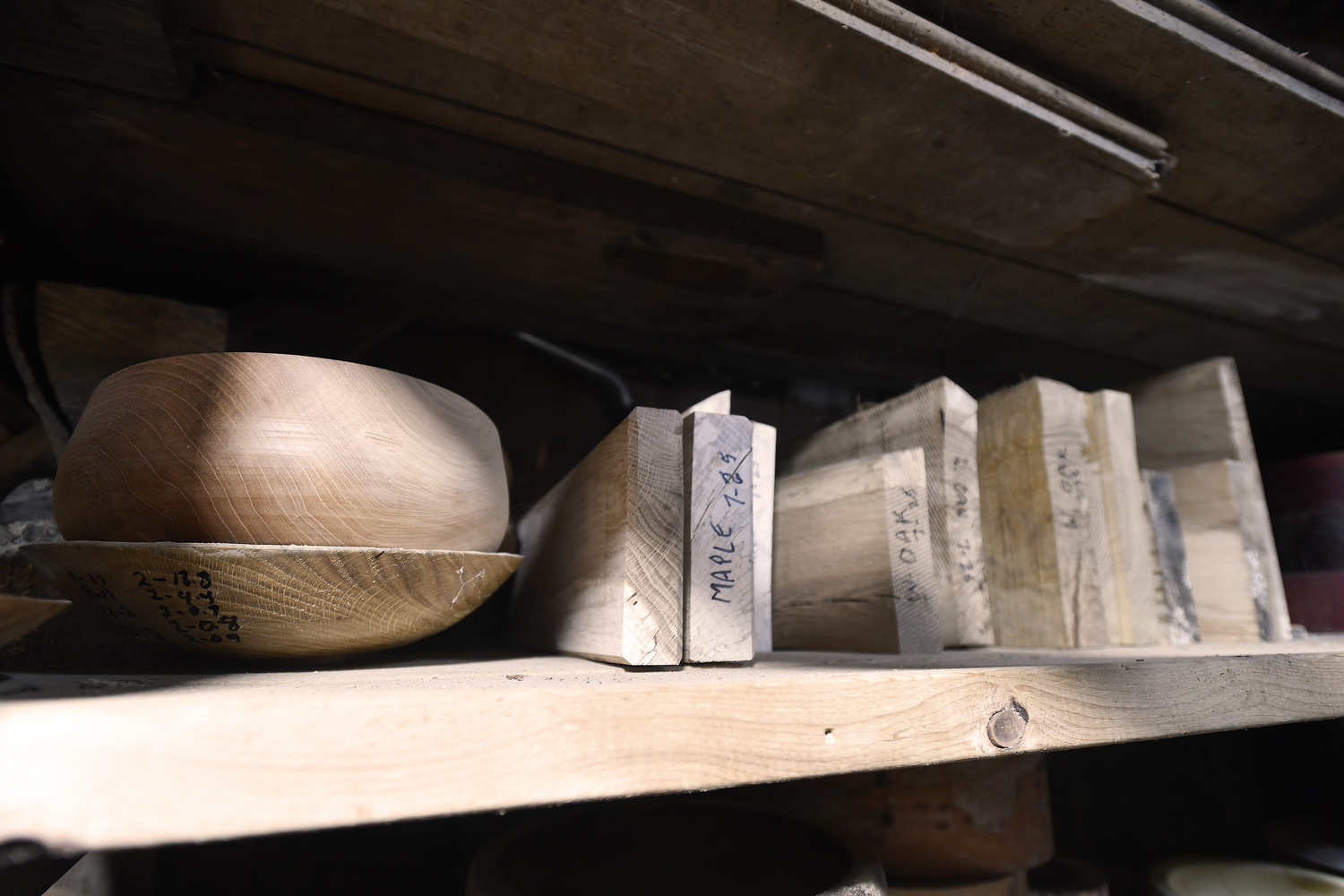 Inside John Halsey's woodworking shop in Water Mill. Halsey has found a second act as a wood-turner in retirement, making beautiful hand-crafted bowls, pens and other one-of-a-kind decorative items. DANA SHAW
