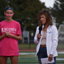 Elizabeth Sultan, left, with Lisa Hubbard, who works at Peconic Bay Medical Center. Peconic Bay Medical Center presented Elizabeth with a check for $500 at the Westhampton Beach varsity girls soccer game last month to cover start-up costs for Peter's Packages, the organization Elizabeth founded in honor of her father, a Peconic Bay surgeon who died in July. COURTESY CARA SULTAN