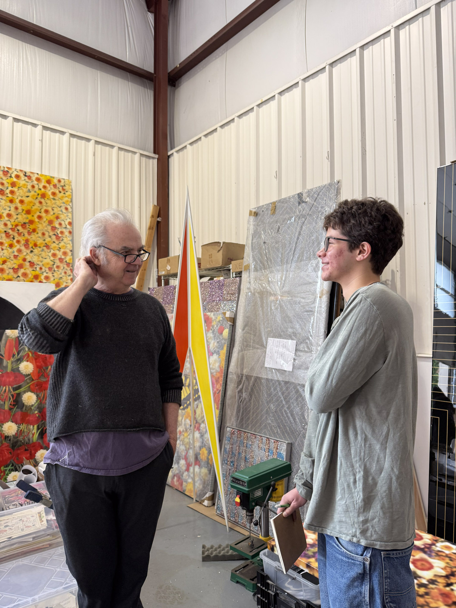 East Hampton High School students visiting Peter Dayton for the Student Art Festival. KAYLA MATTERS