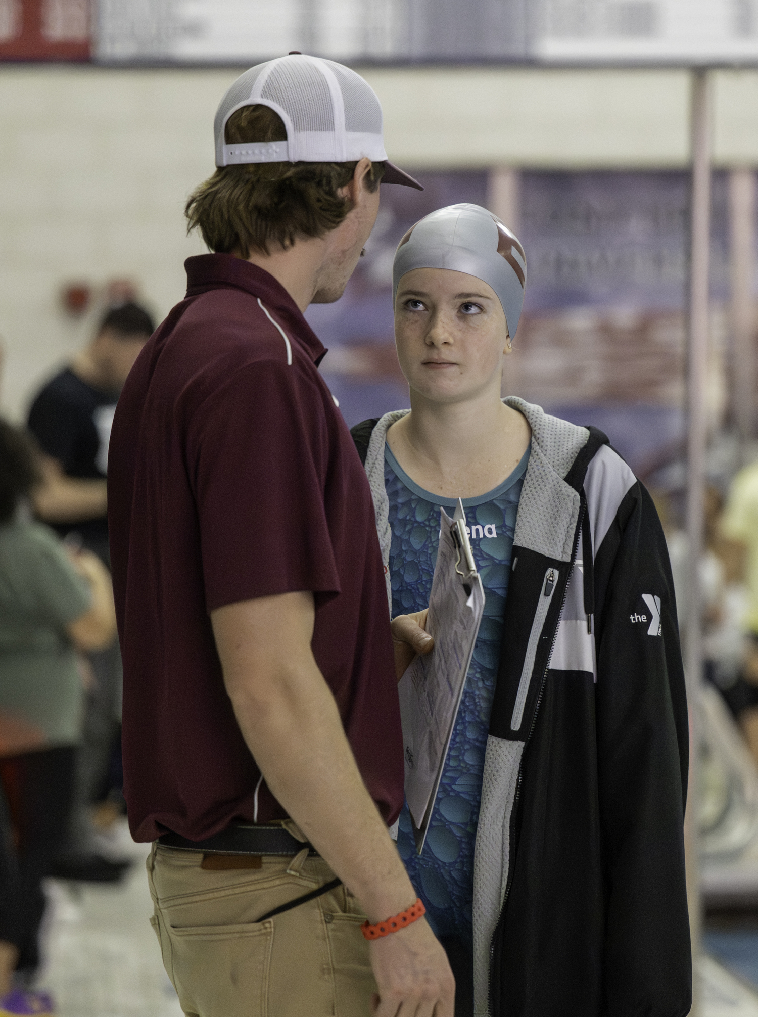 Sydney Powers gets some last-minute encouragement from coach Thomas Brierley.  MARIANNE BARNETT