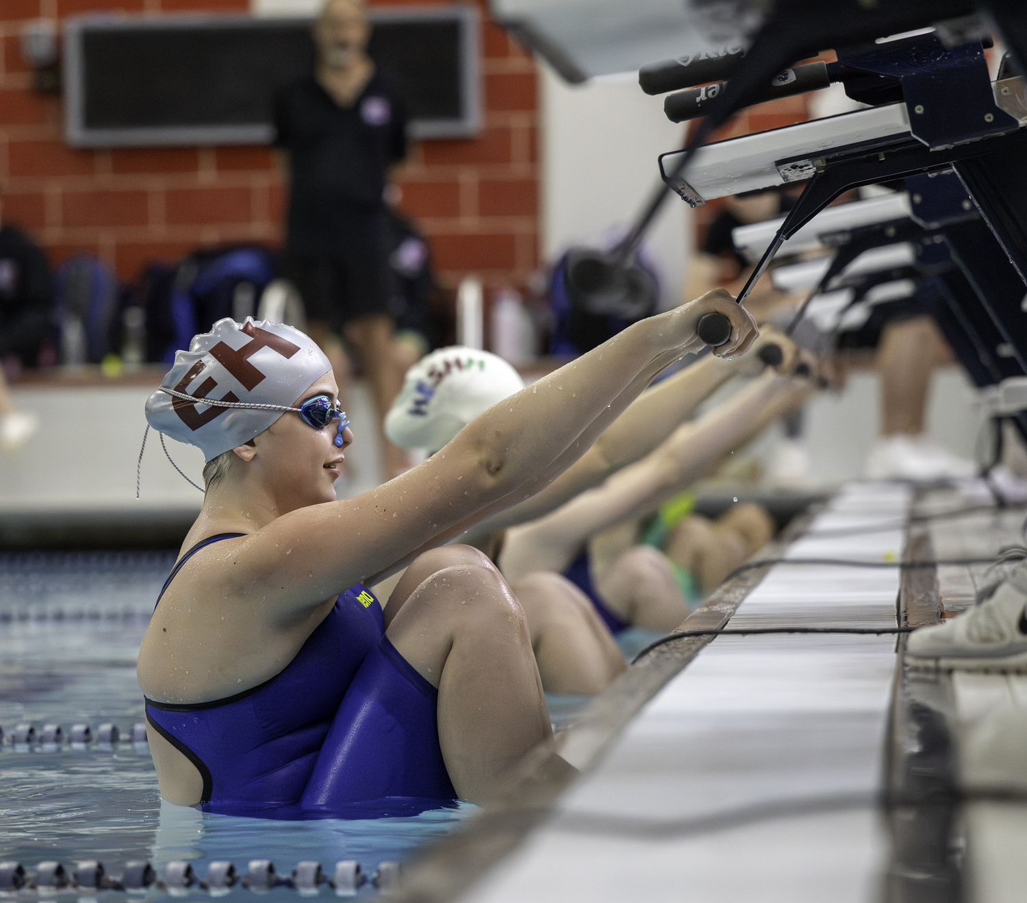 Mia Milazzo gets set for the 100-yard backstroke.  MARIANNE BARNETT