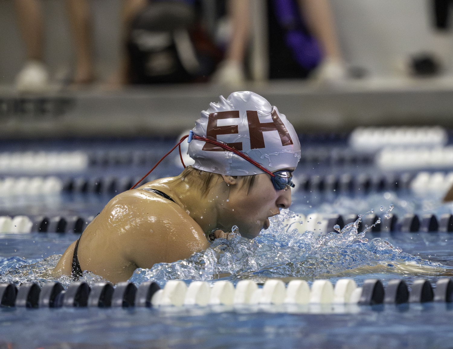 Lily Caplin competes in the 100-yard breaststroke.  MARIANNE BARNETT