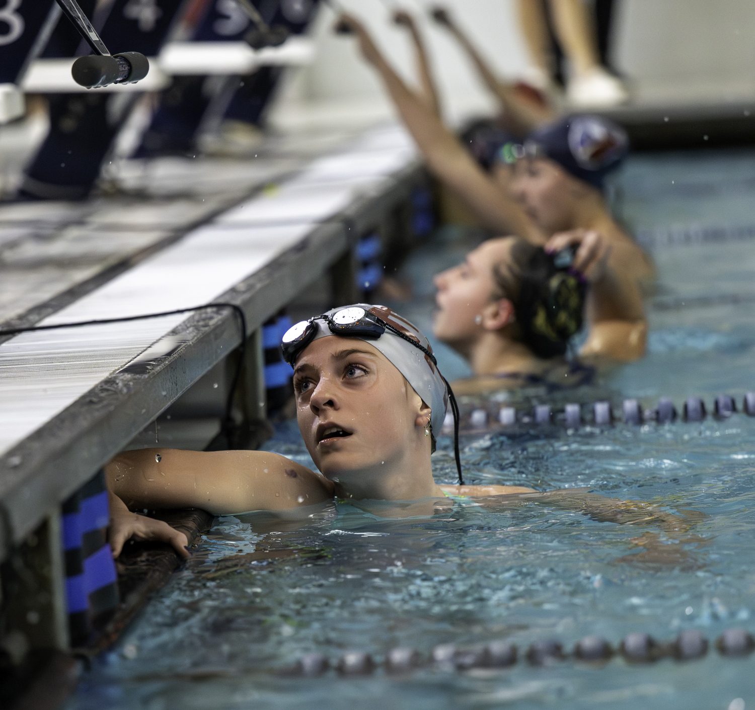 Heidi Rizzo gives a quick peek in on her time in the 500-yard freestyle.  MARIANNE BARNETT
