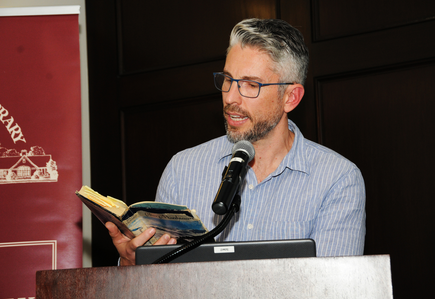 Author Lance Richardson reads from his book “Biography as Pilgrimage: On the Trail of Peter Matthiessen.” at the East Hampton Library's final event in the 2025 Tom Twomey Series, on Saturday.    RICHARD LEWIN