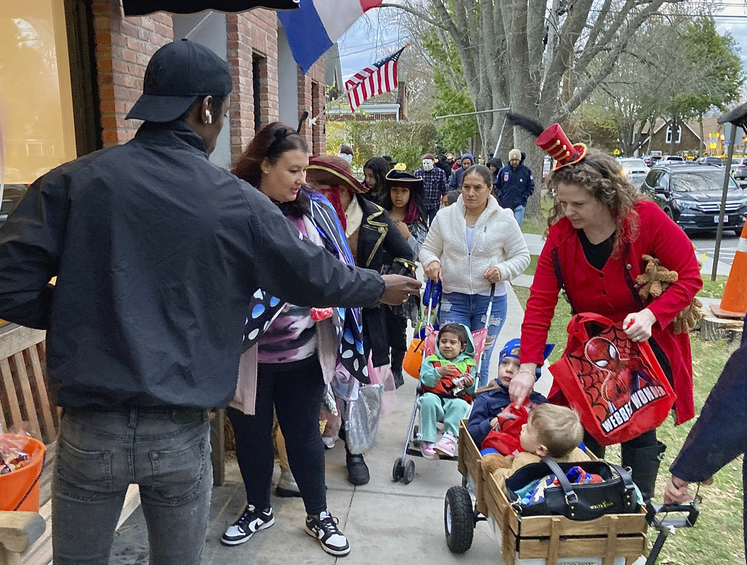 Trick or Treaters took to the streets of East Hampton on Friday, visiting shops and homes to meet their candy quota. KYRIL BROMLEY