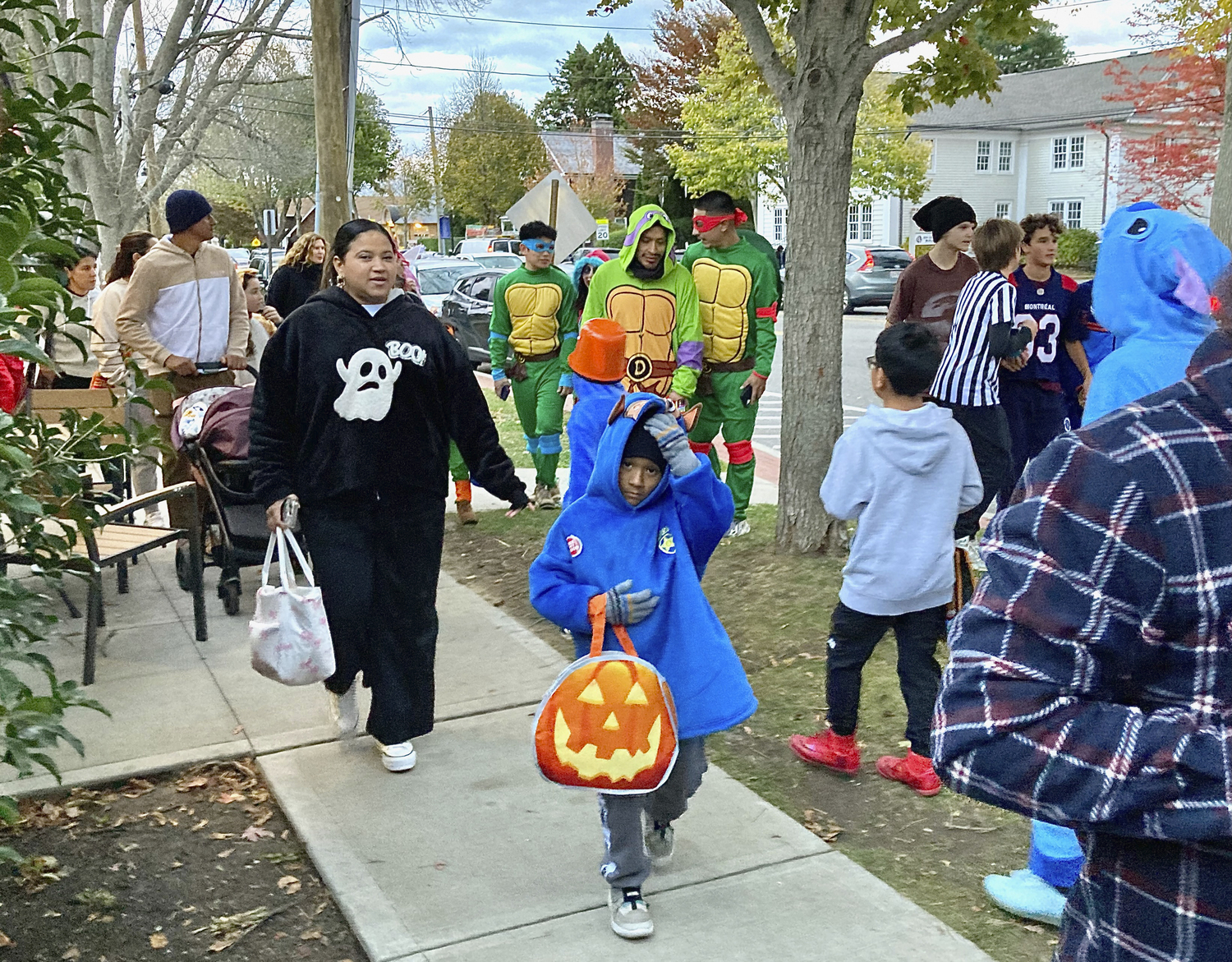 Trick or Treaters took to the streets of East Hampton on Friday, visiting shops and homes to meet their candy quota. KYRIL BROMLEY