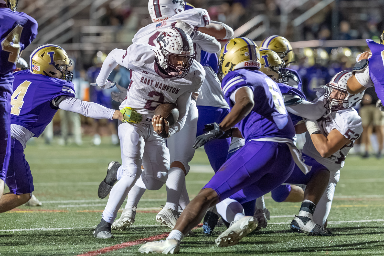 Bridgehampton senior Jai Feaster breaks one tackle and looks to gain more yards.  RON ESPOSITO
