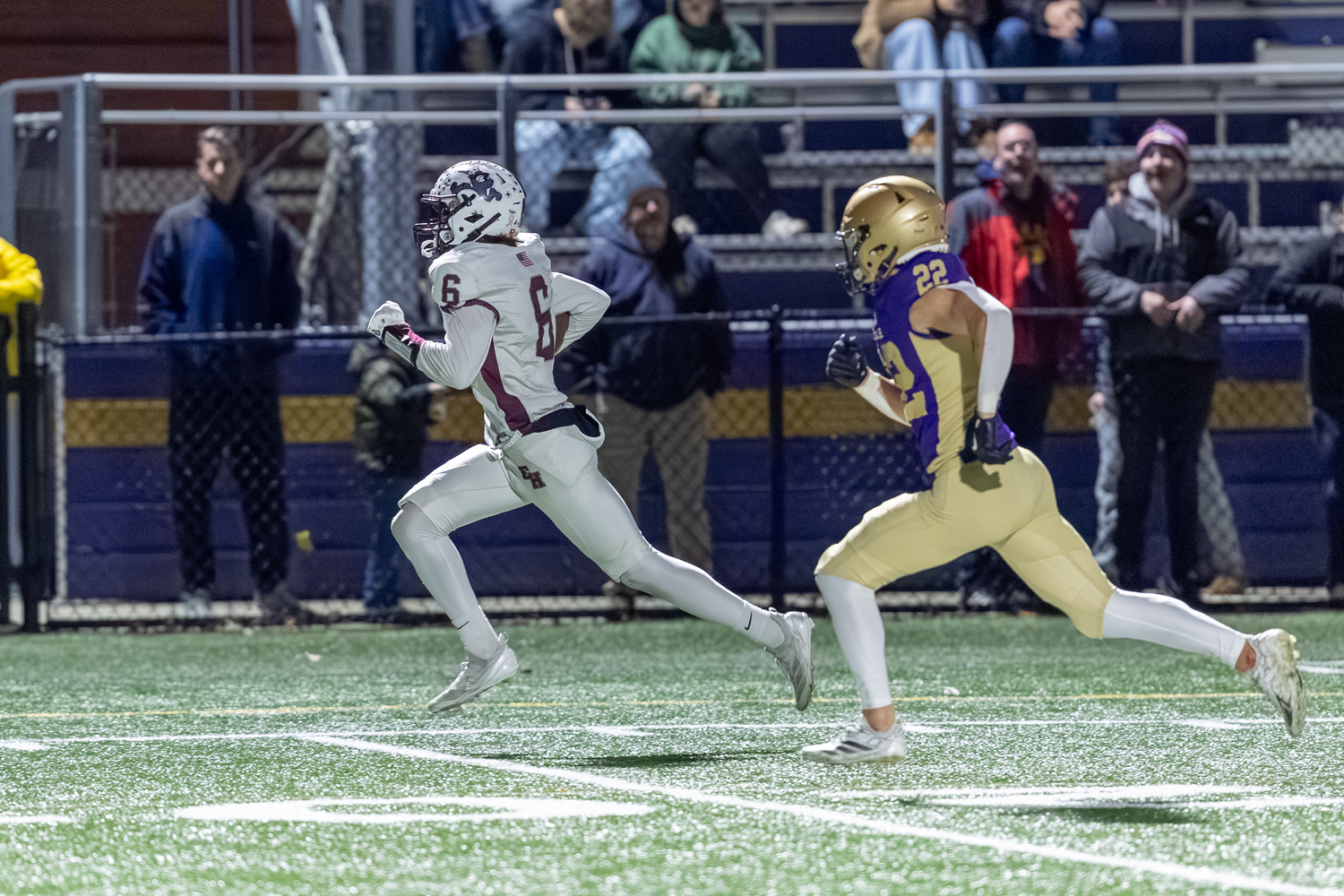 East Hampton senior Livs Kuplins on his way to the end zone.  RON ESPOSITO