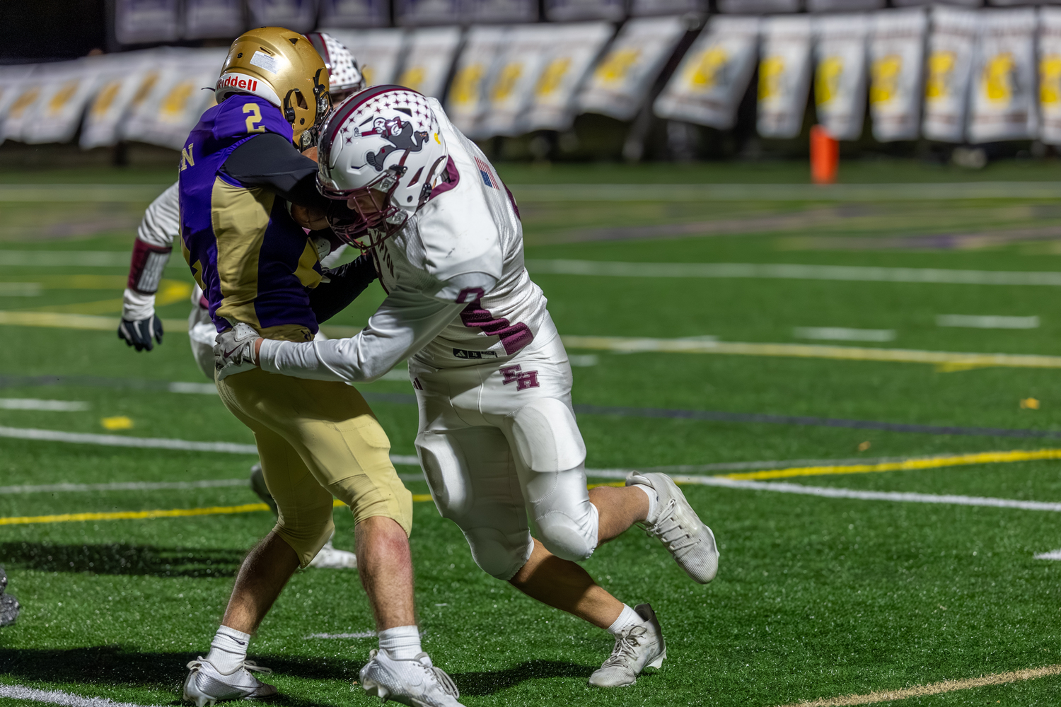 East Hampton senior Charlie Stern leads a tackle. RON ESPOSITO
