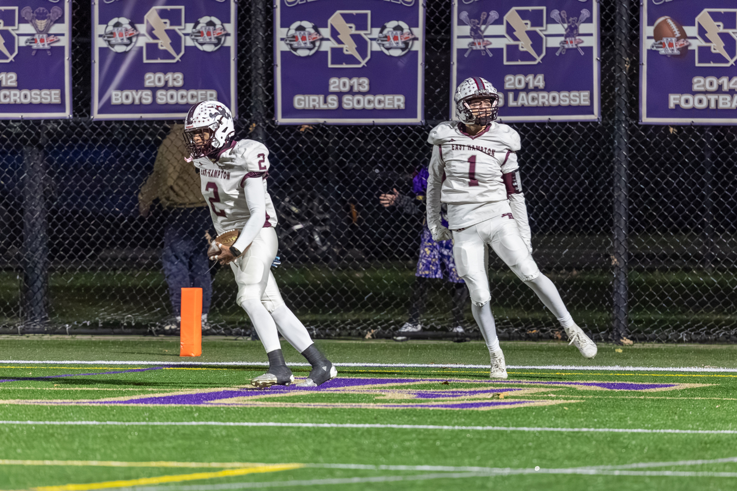 Jai Feaster (2) and Cole Dunchick (1) are pumped up after Feaster's touchdown gave the Bonackers an early lead on Friday night.  RON ESPOSITO